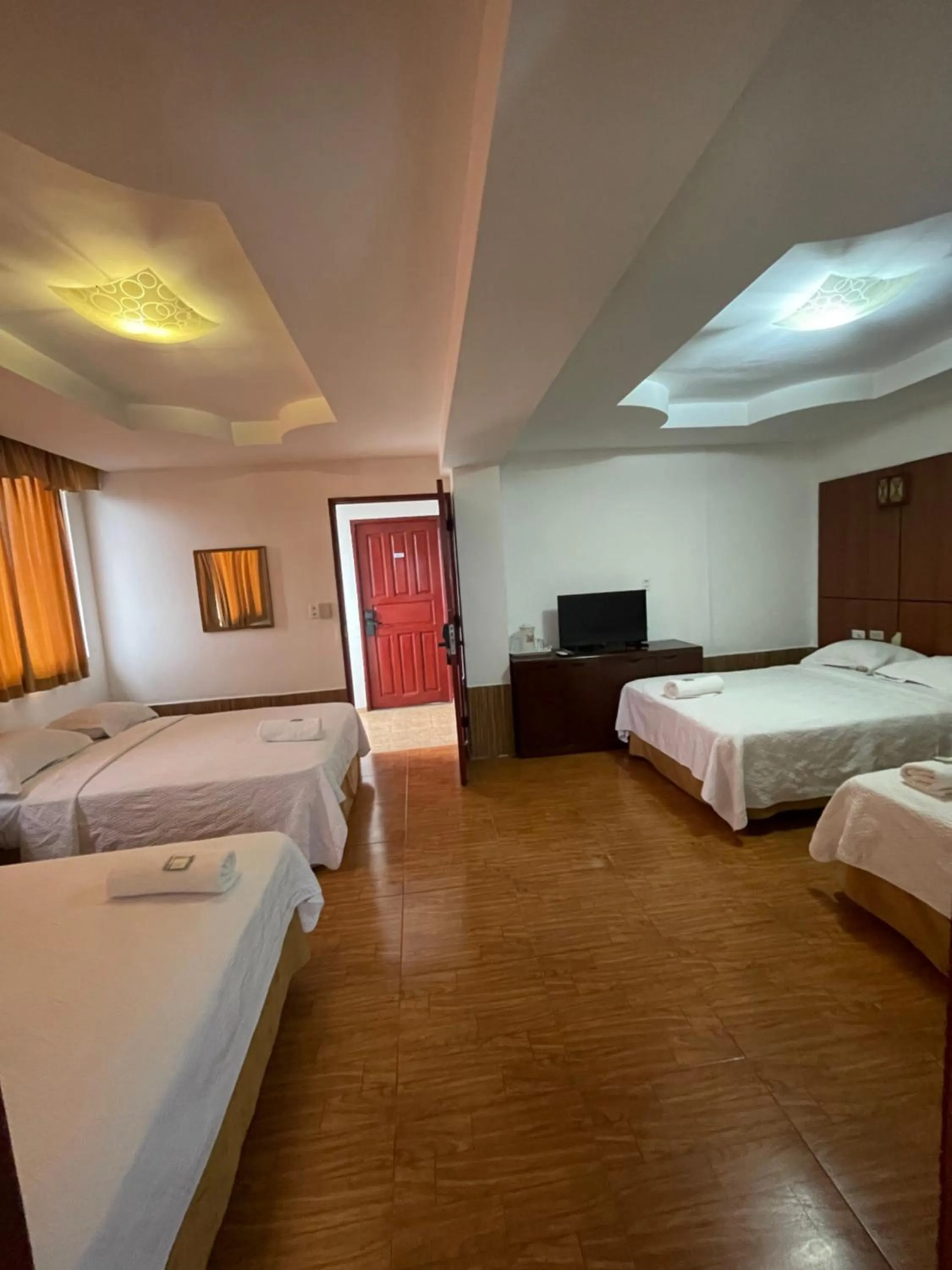 Bed in Hotel Costa Inn