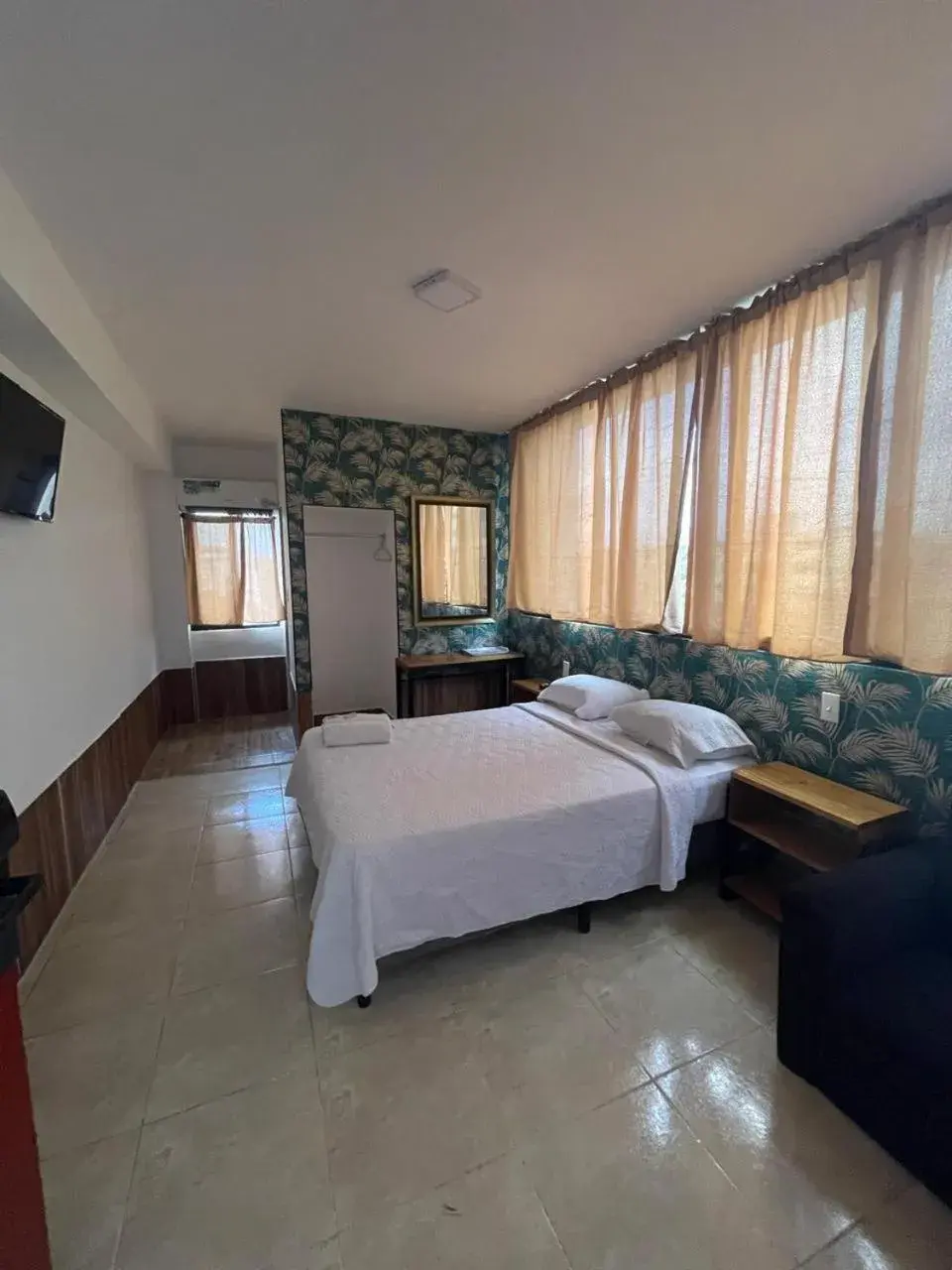 Bed in Hotel Costa Inn Bed in Hotel Costa Inn