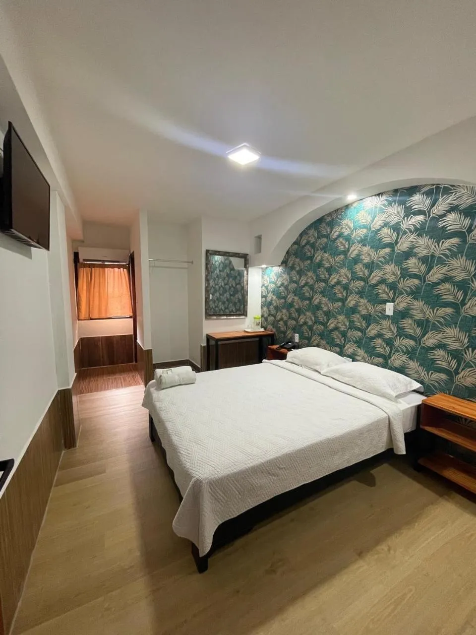 Bed in Hotel Costa Inn