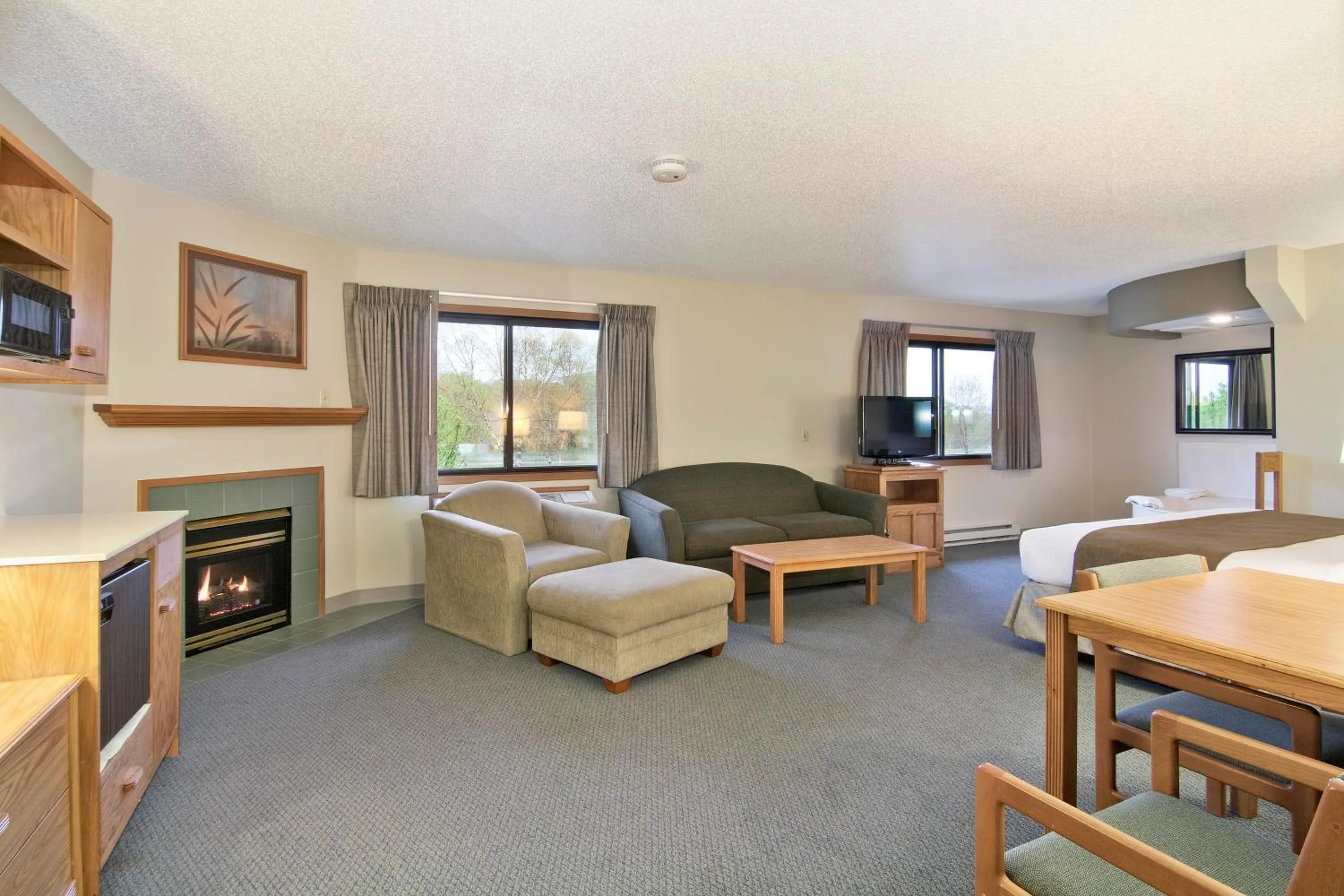 Seating area in Boarders Inn & Suites by Cobblestone Hotels - Faribault