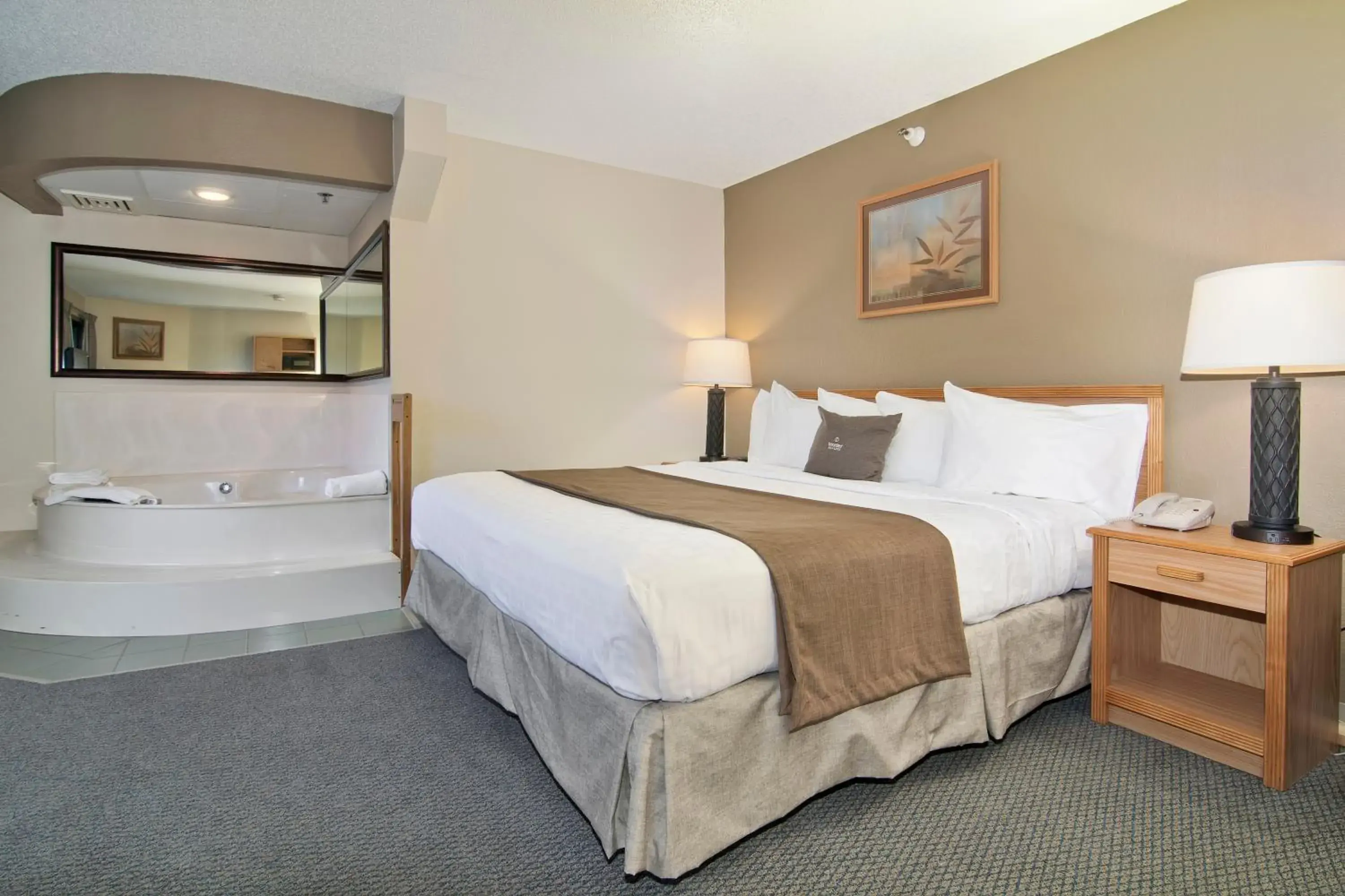 Bed in Boarders Inn & Suites by Cobblestone Hotels - Faribault Bed in Boarders Inn & Suites by Cobblestone Hotels - Faribault