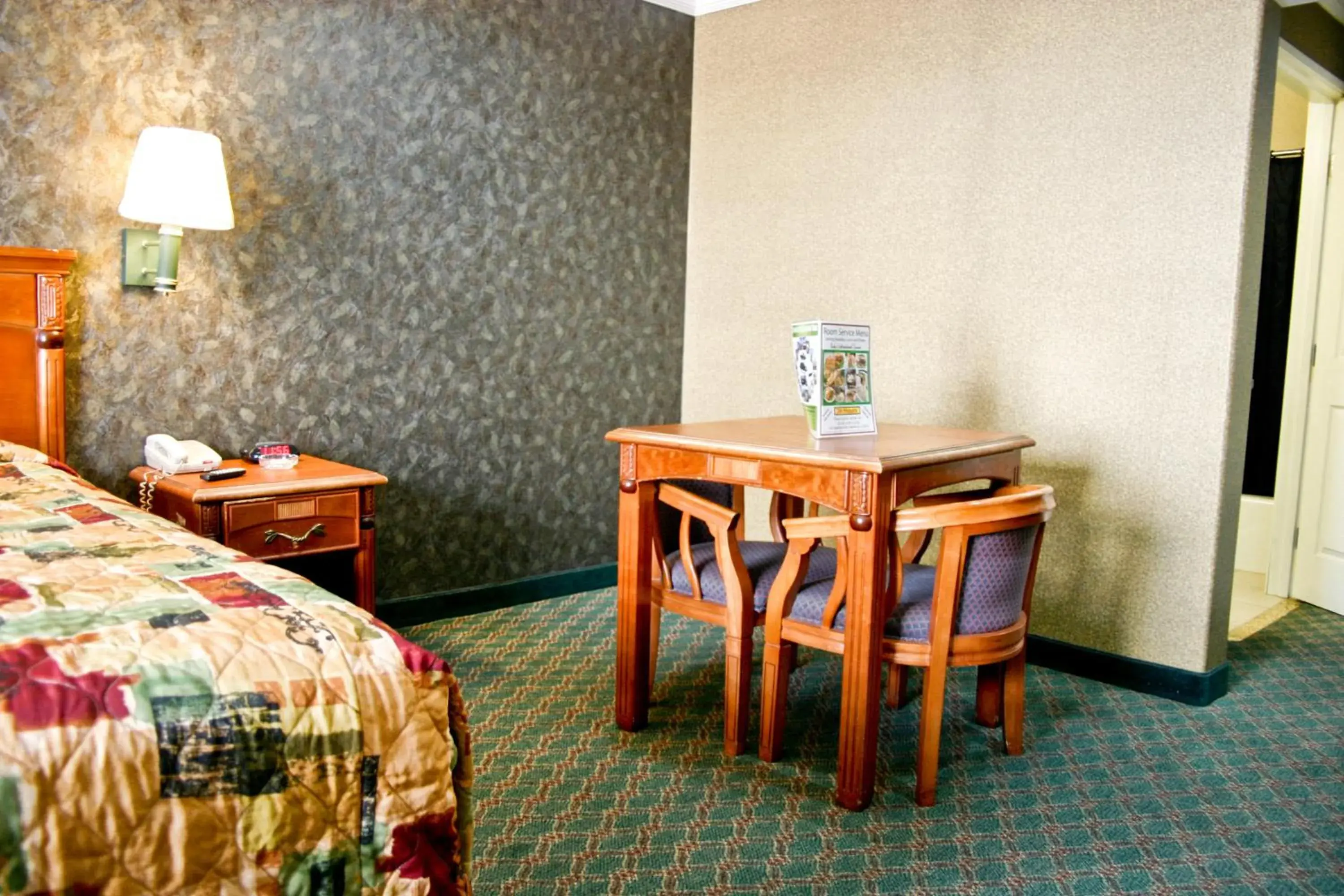 Seating area, Bed in Crystal Inn Suites & Spas Seating area, Bed in Crystal Inn Suites & Spas