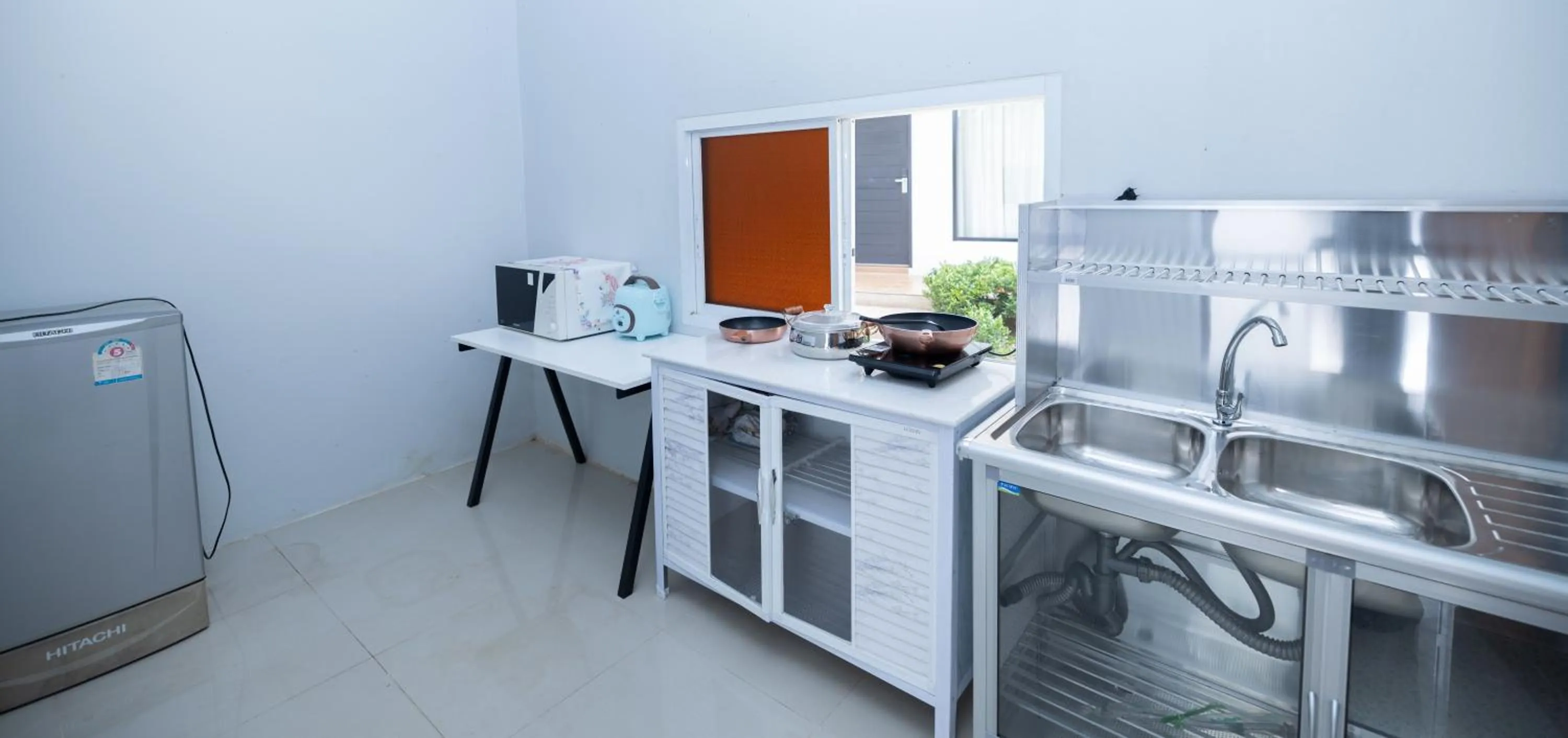 Kitchen or kitchenette in Blue Carina Hotel Phuket
