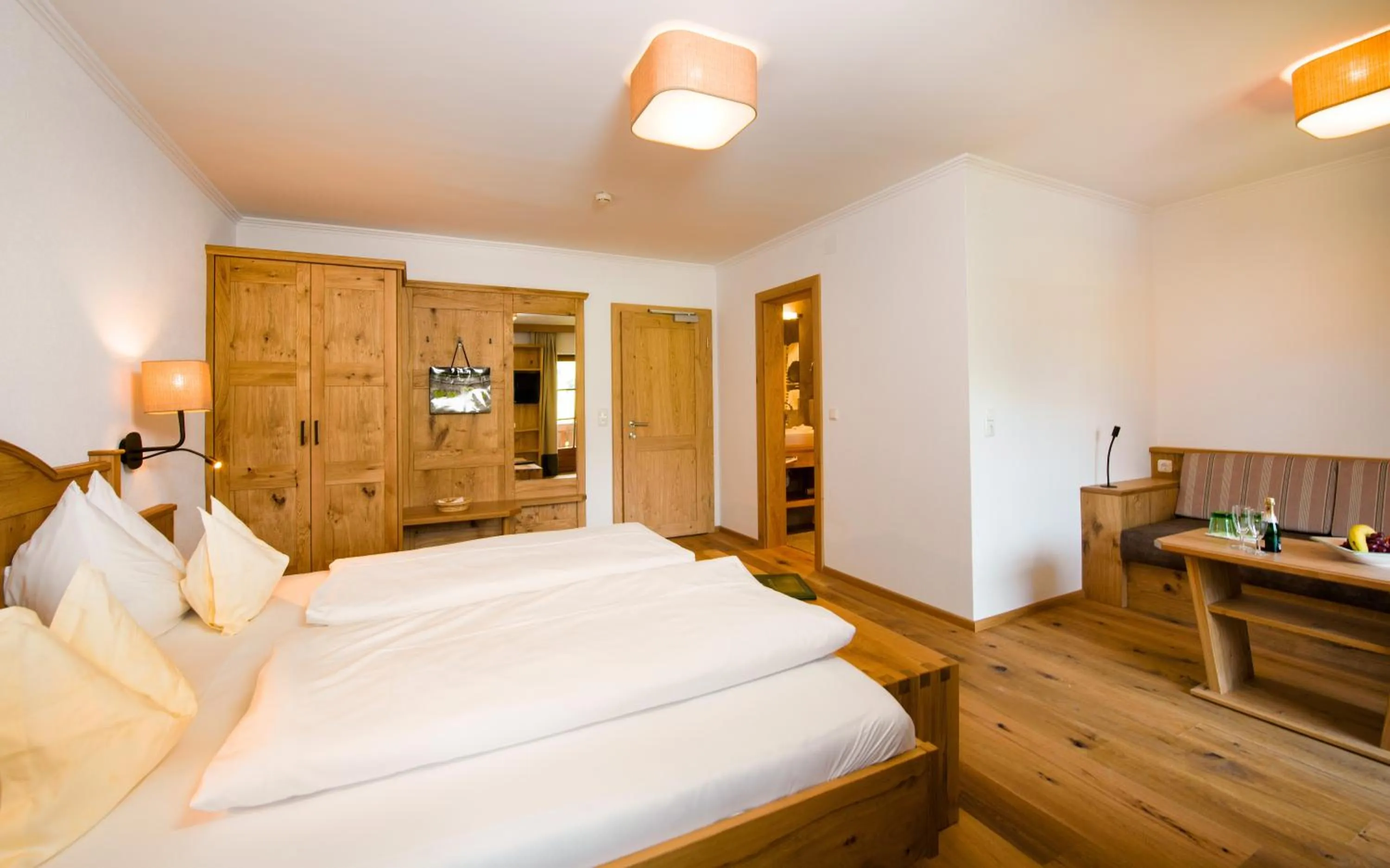 Photo of the whole room, Bed in Wellness & Sporthotel Alpenhof