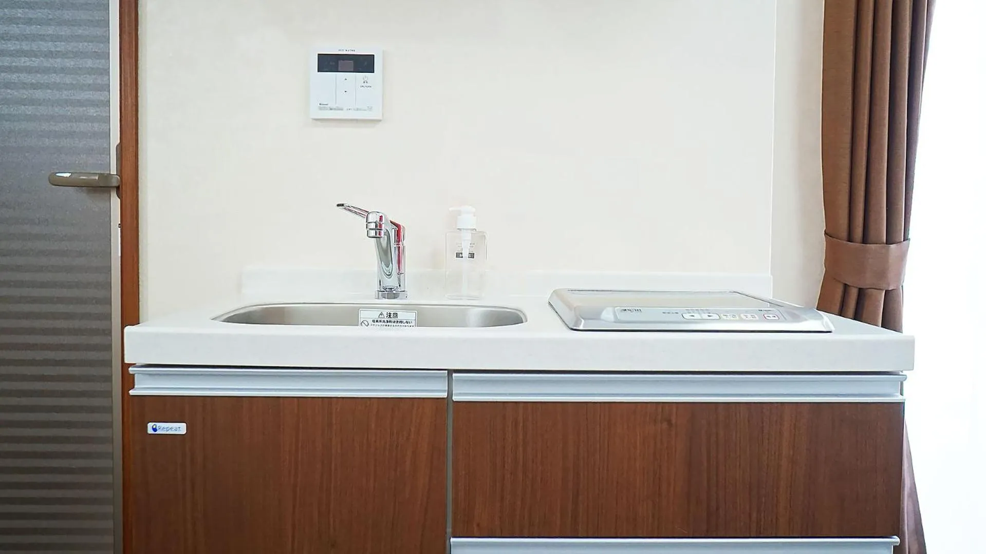 Kitchen or kitchenette in Hotel From Okinawa