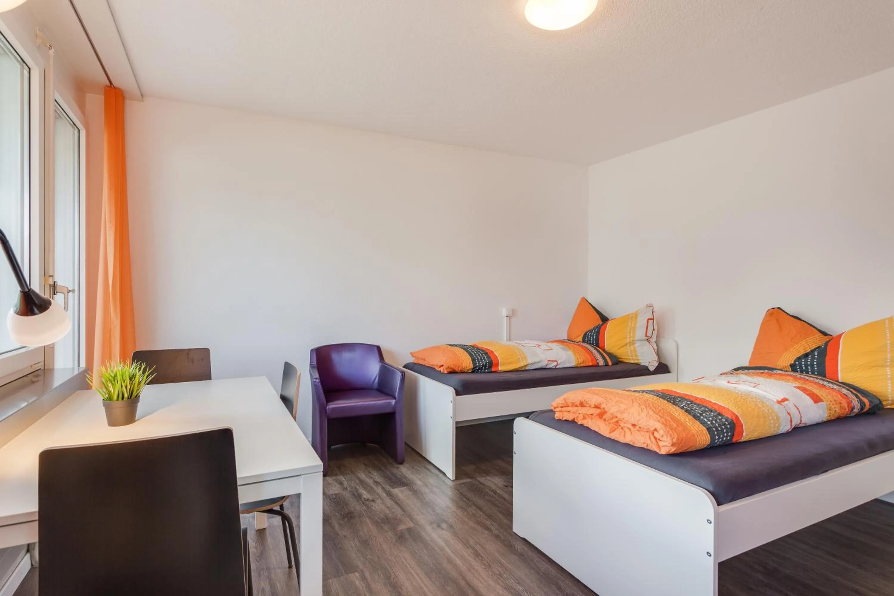 Photo of the whole room, Bed in Anstatthotel Zug - app self-check-in