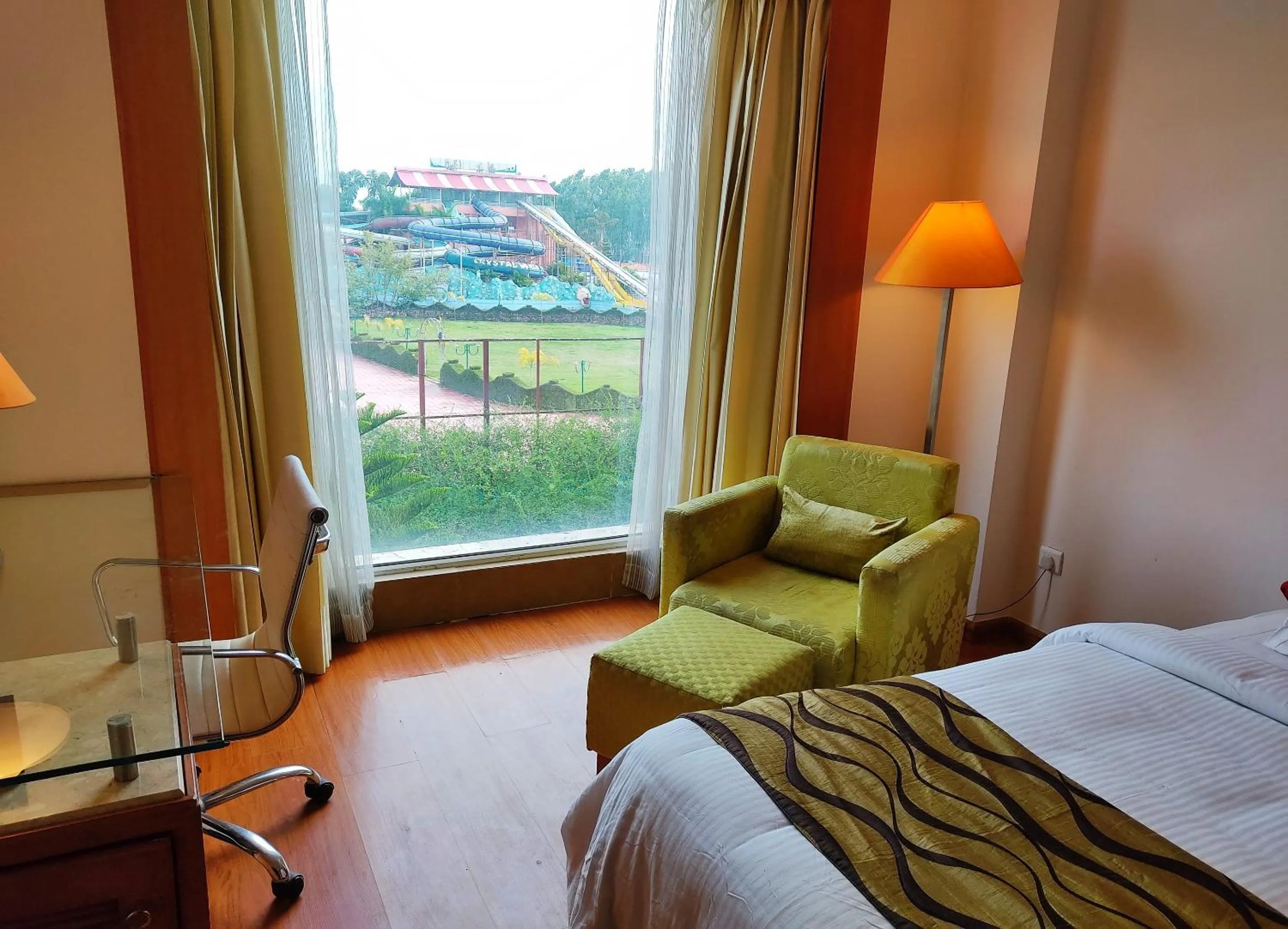 View (from property/room), Bed in Ambrosia Sarovar Portico