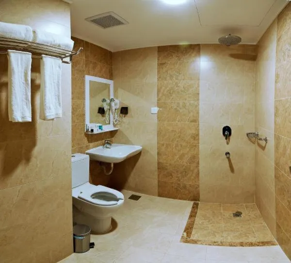 Bathroom in Delights Inn - Green Oasis Hotel