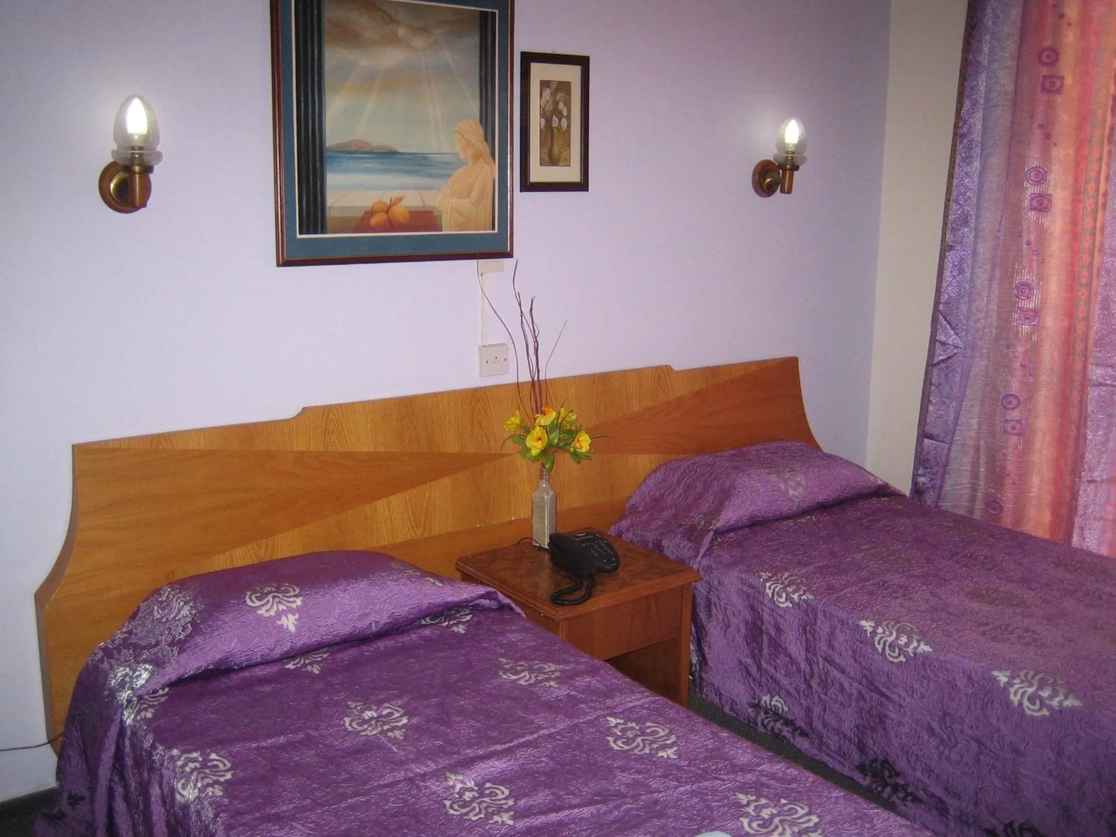 Bed in Onisillos Hotel