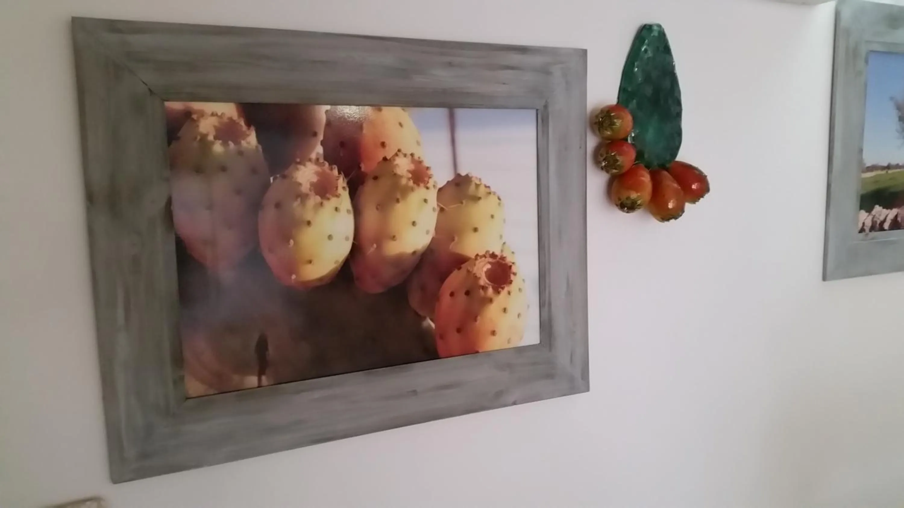 Communal lounge/ TV room in B&B La Porta Vecchia