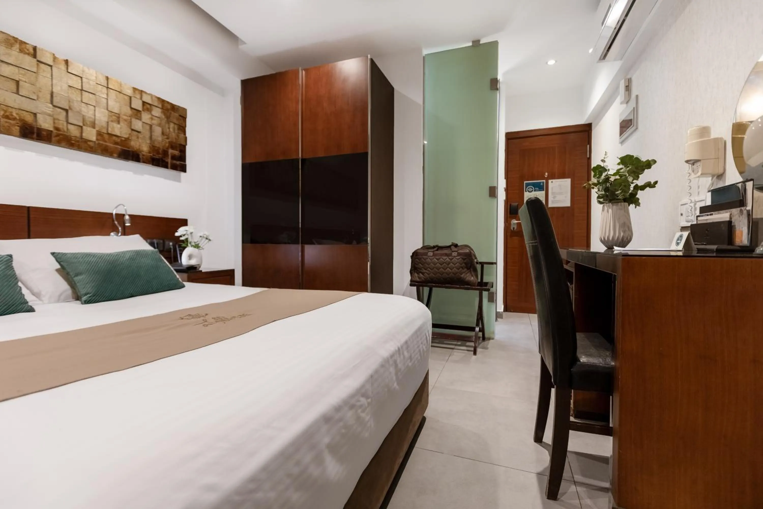 Bed in Achilleos City Hotel