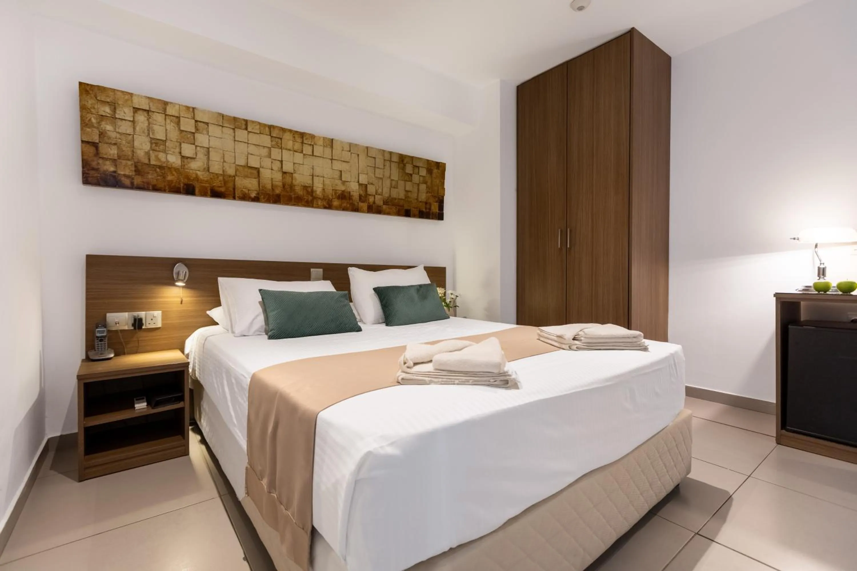 Bed in Achilleos City Hotel