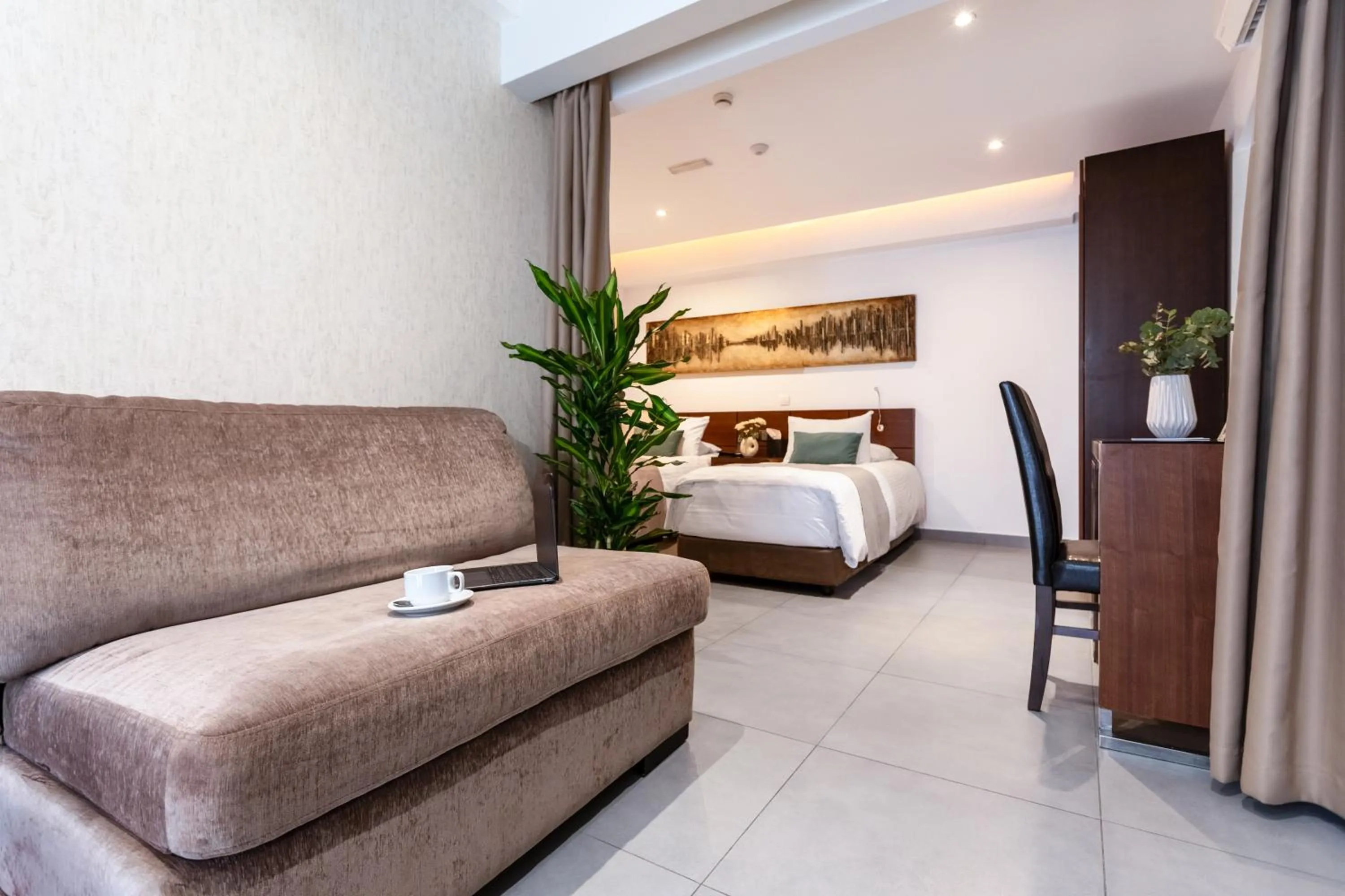 Bed in Achilleos City Hotel