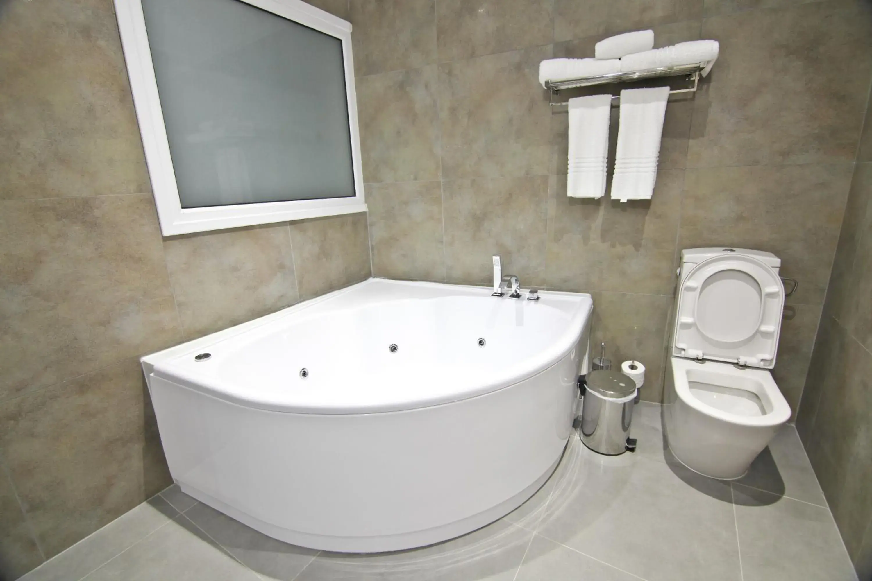 Bathroom in Achilleos City Hotel Bathroom in Achilleos City Hotel