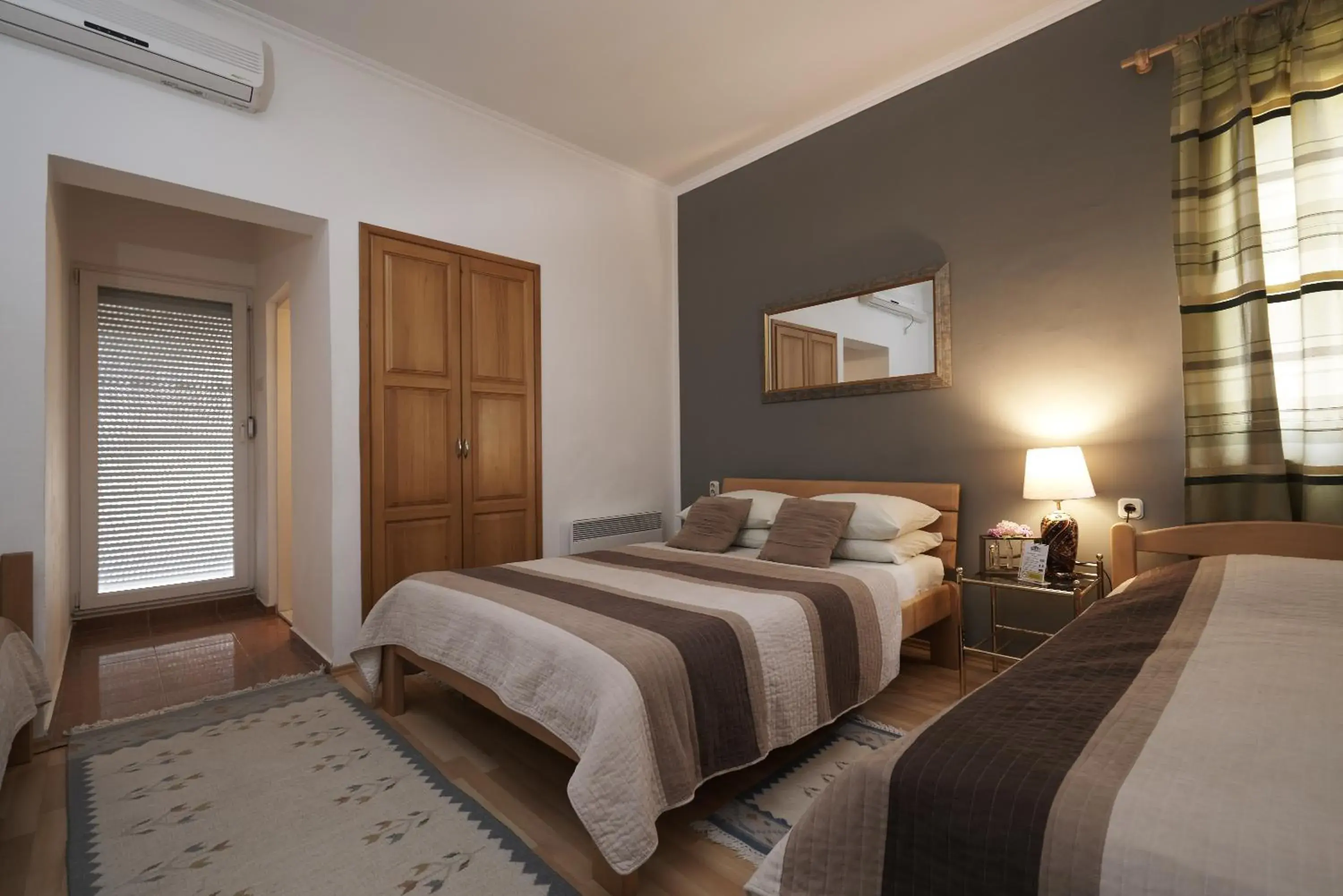 Quadruple Room with Balcony in Pansion Rose Quadruple Room with Balcony in Pansion Rose