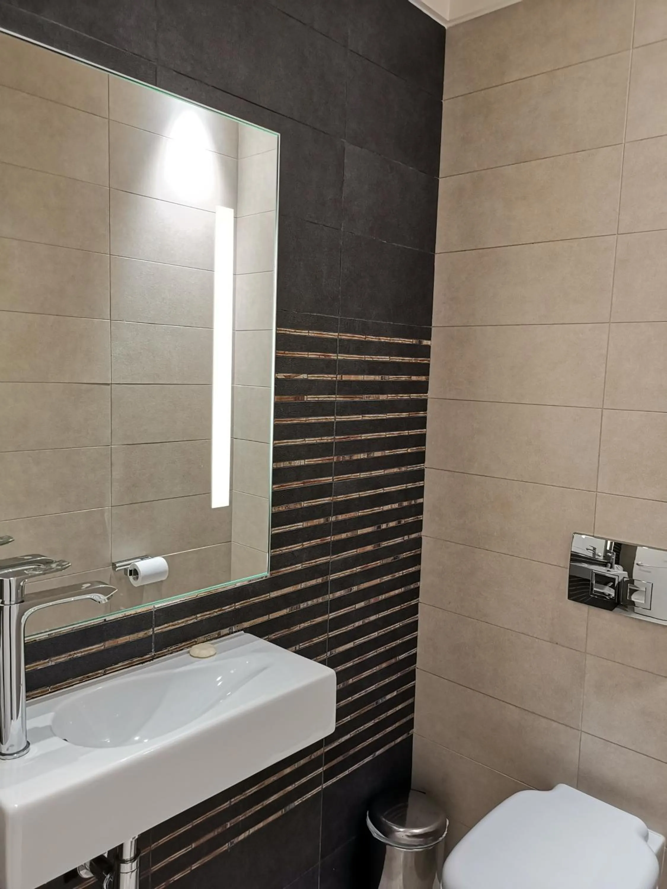 Toilet in Olympic Residence Deluxe Apartments