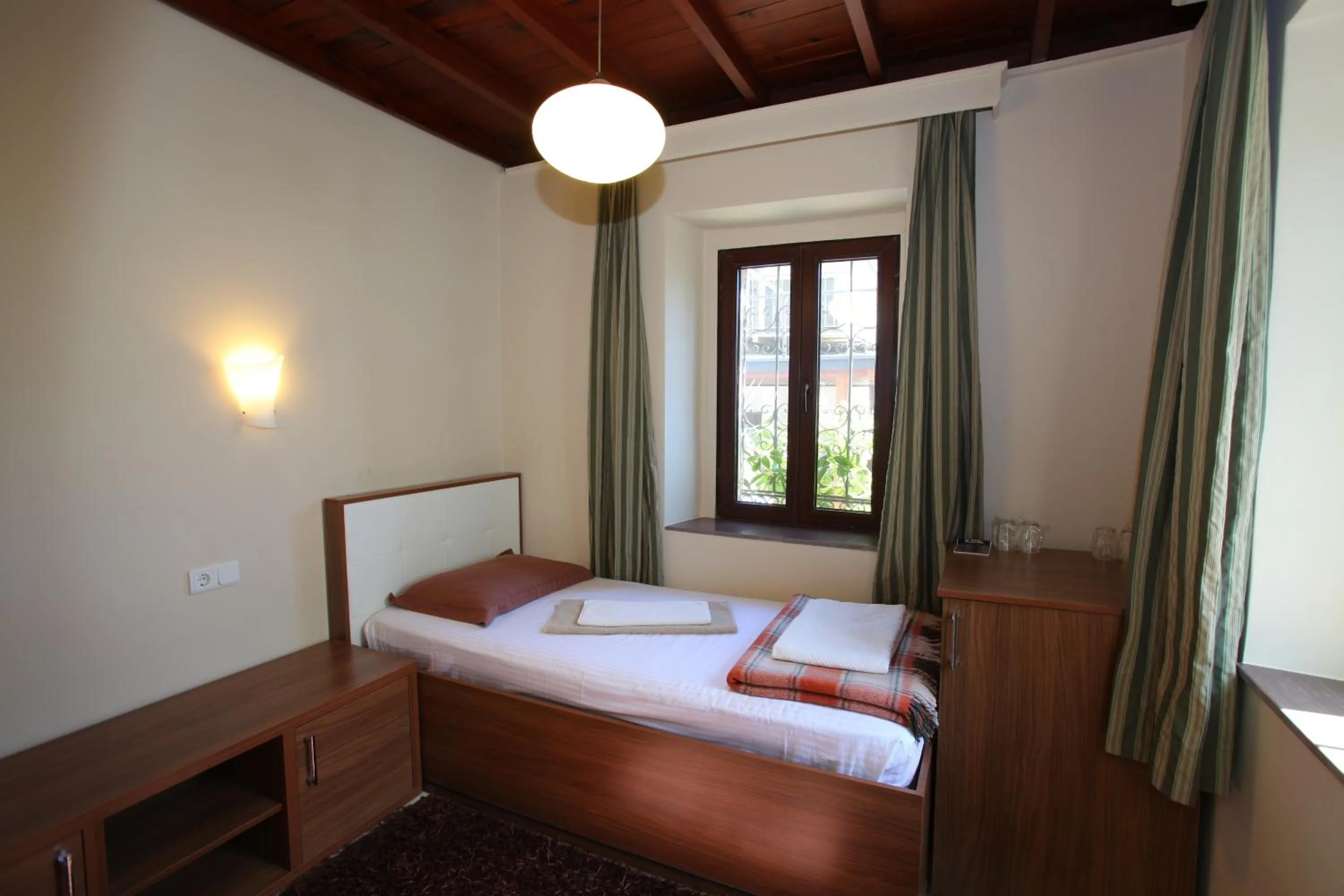 Bed in Albatros Hotel