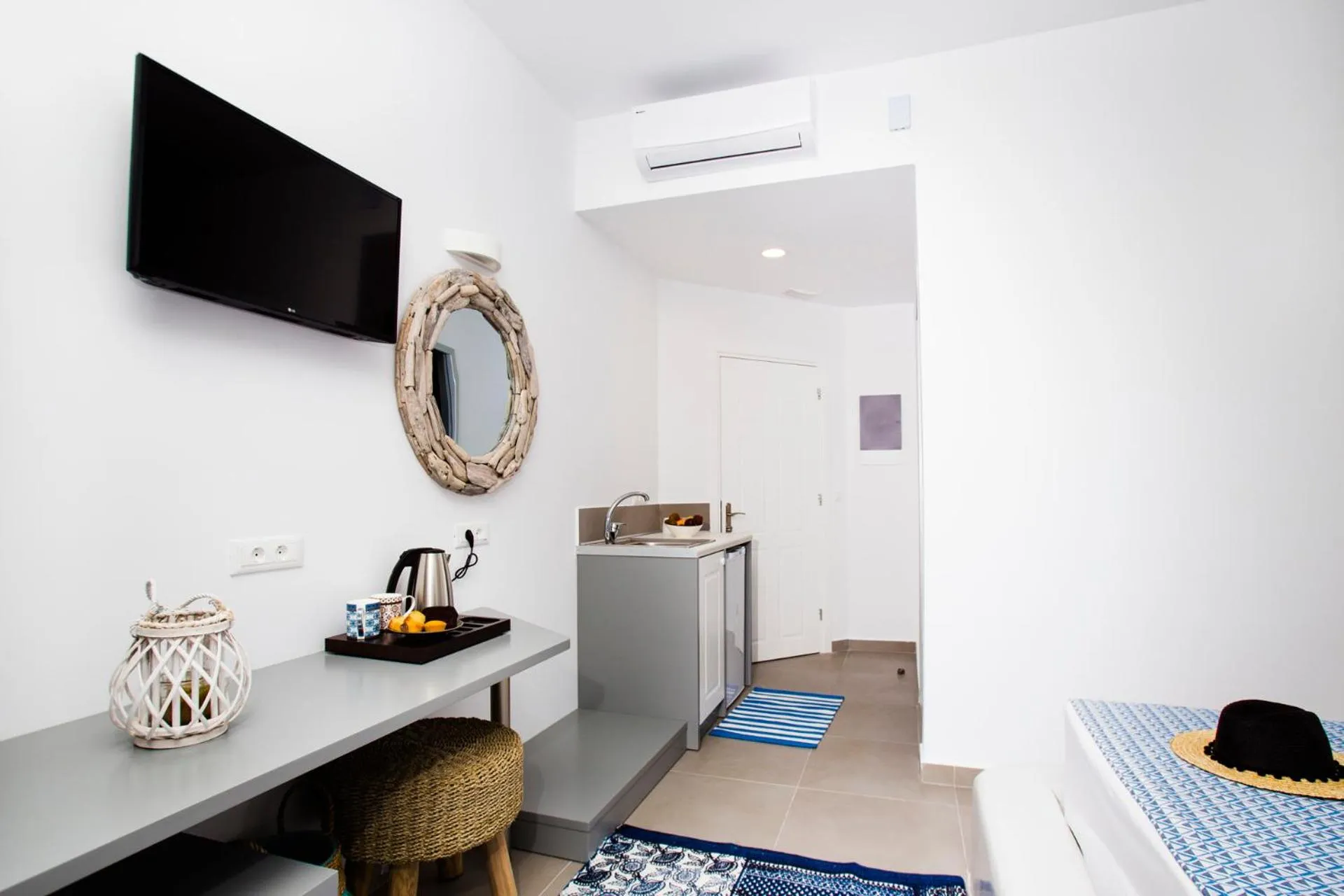 TV and multimedia, Bed in Lindos Portes Suites - Adults Only