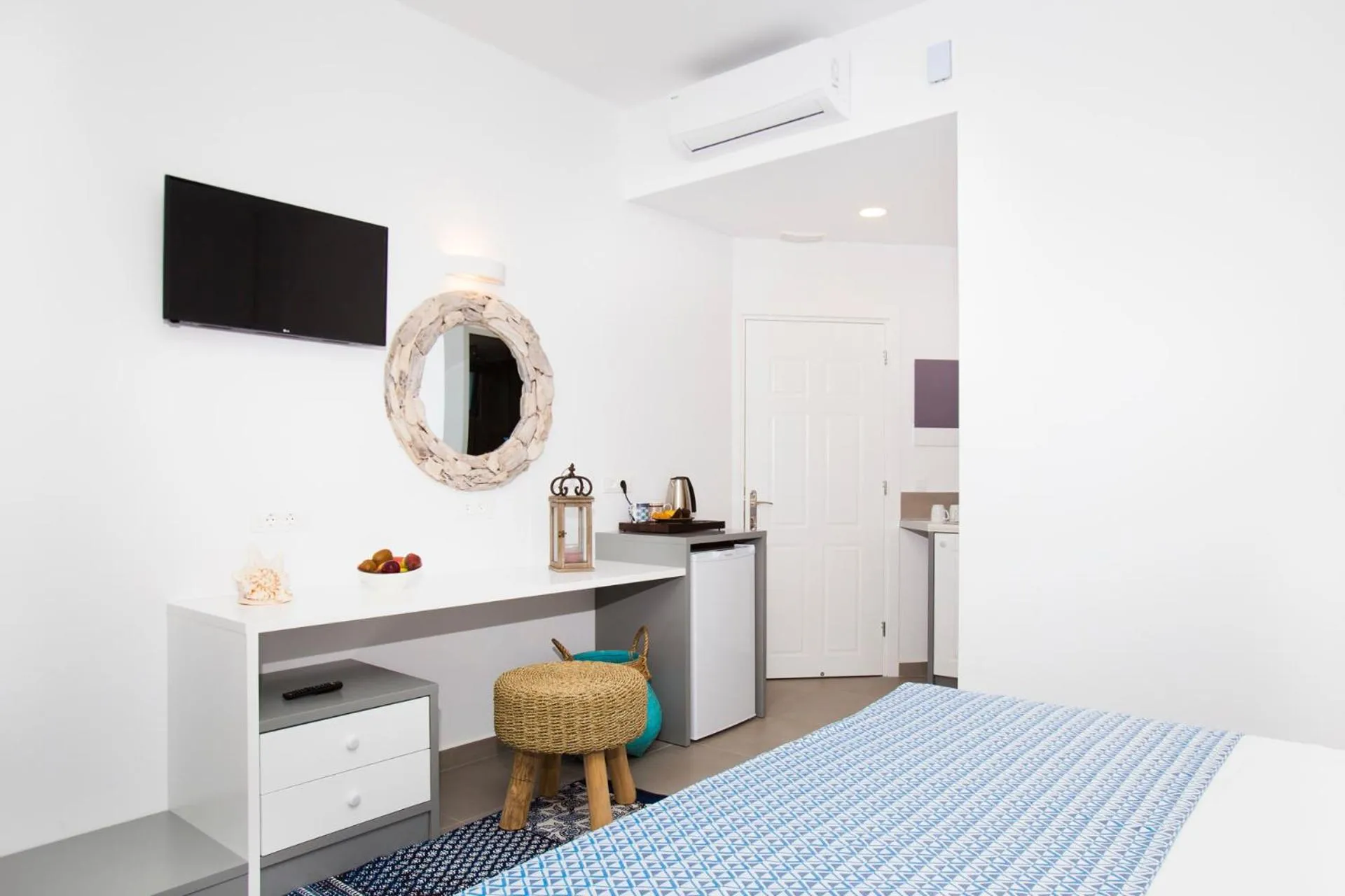 TV and multimedia, Bed in Lindos Portes Suites - Adults Only