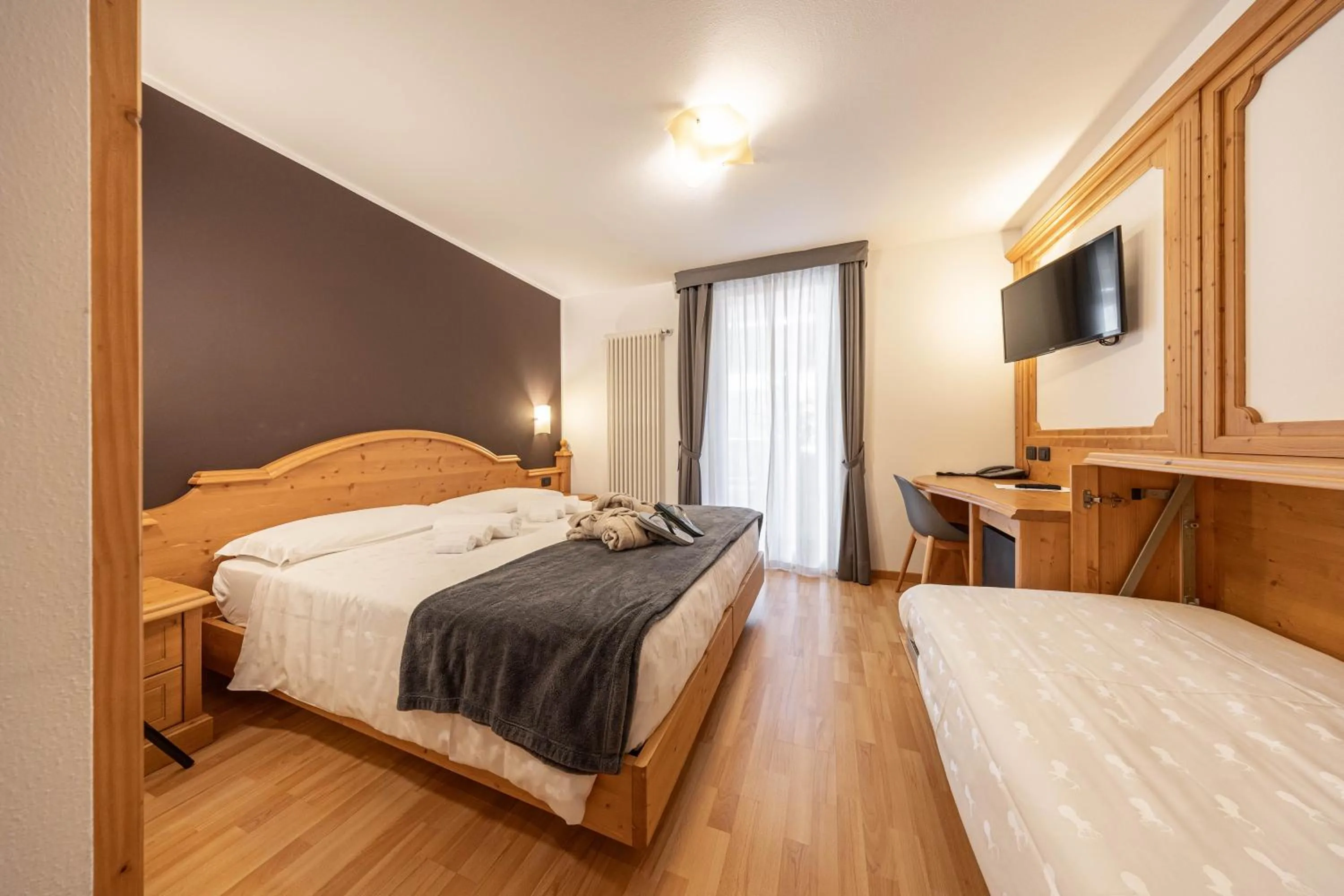 Bed in Hotel La Perla