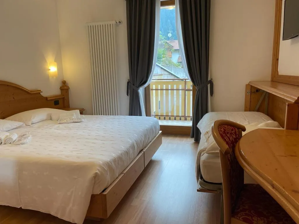 Bed in Hotel La Perla