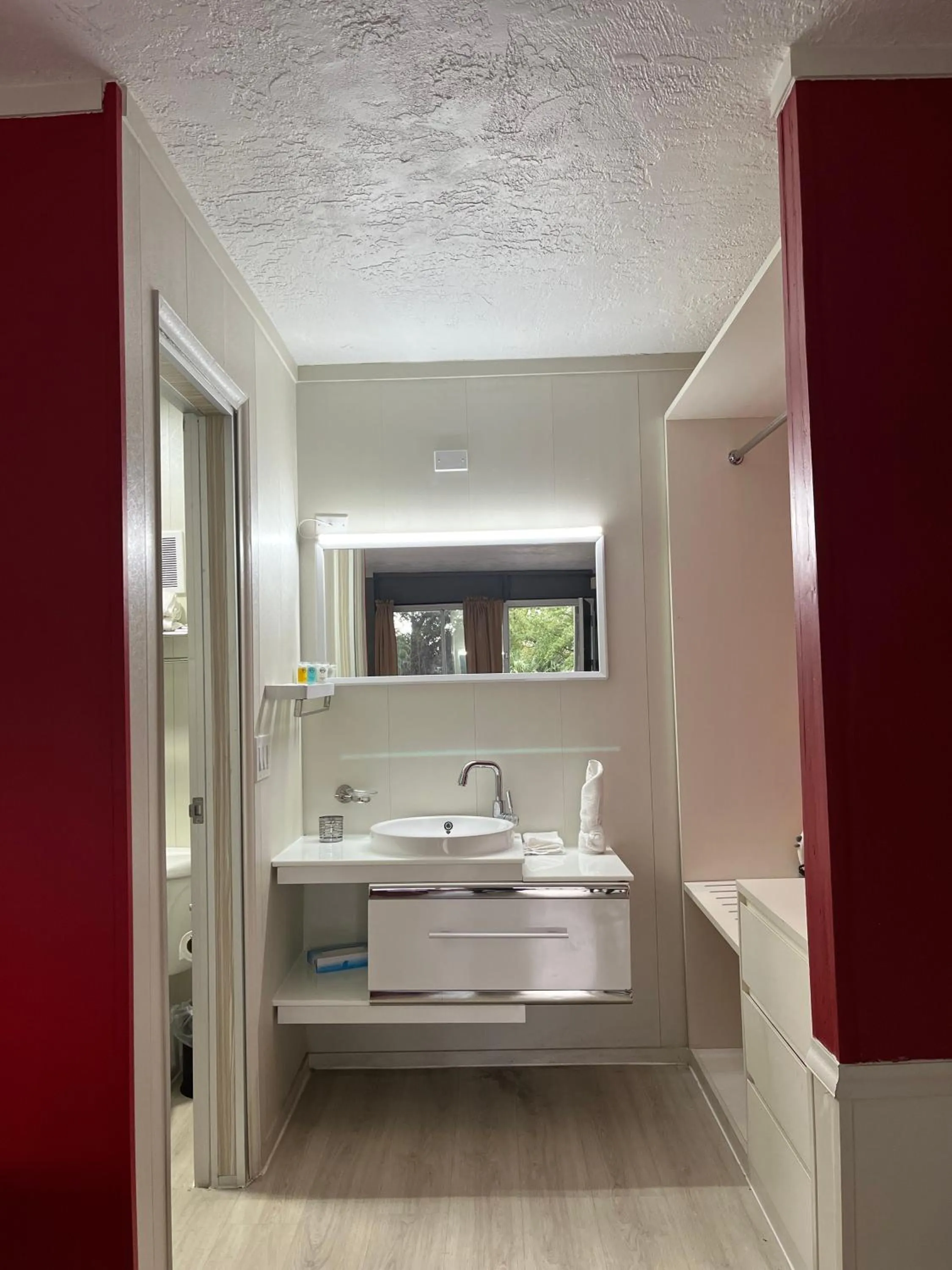 Bathroom in Travelodge by Wyndham Orlando at Heart of International Drive