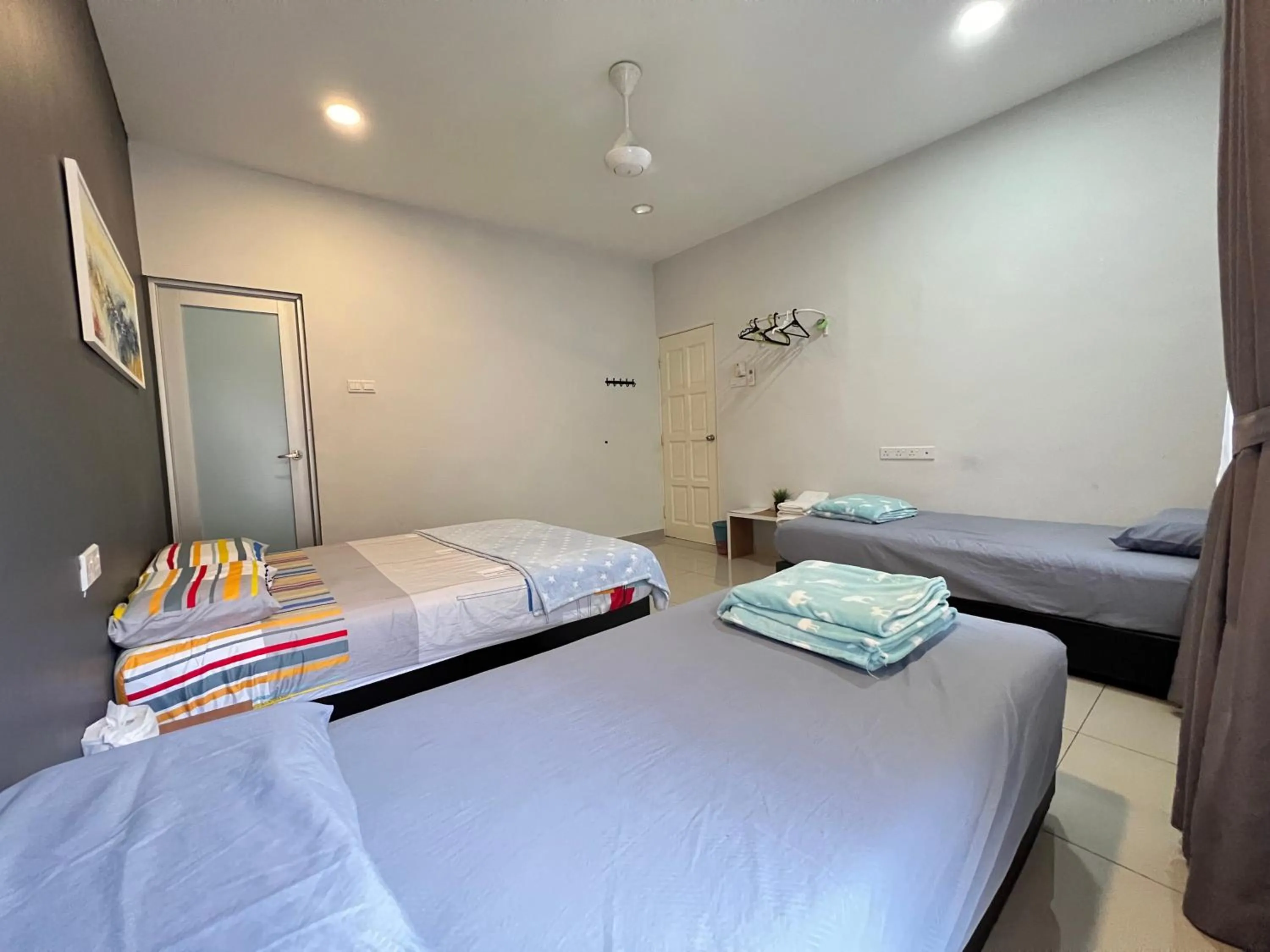 Bed in Jiaxin Homestay - JP Pedana 家馨民宿