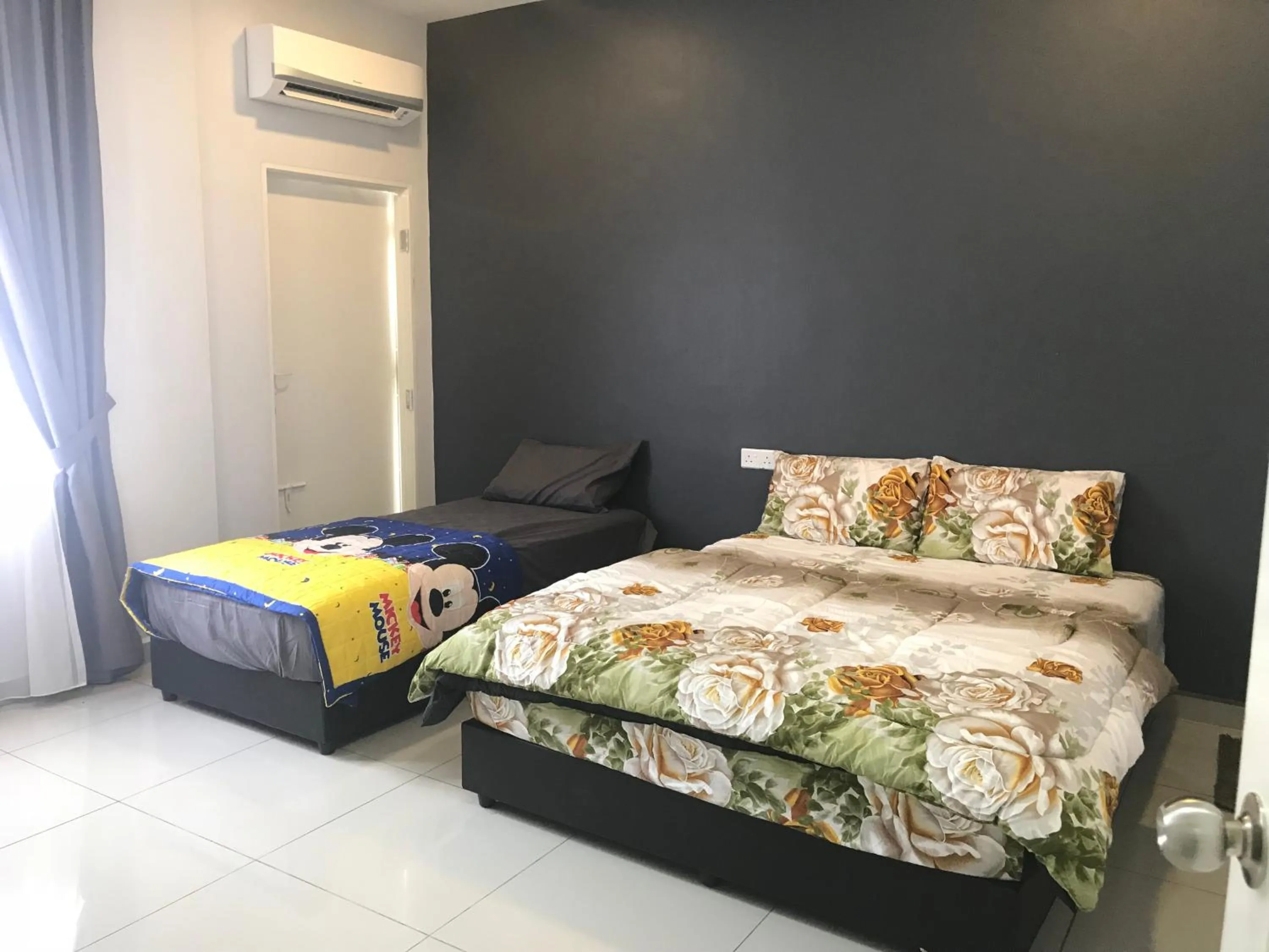 Photo of the whole room, Bed in Jiaxin Homestay - JP Pedana 家馨民宿