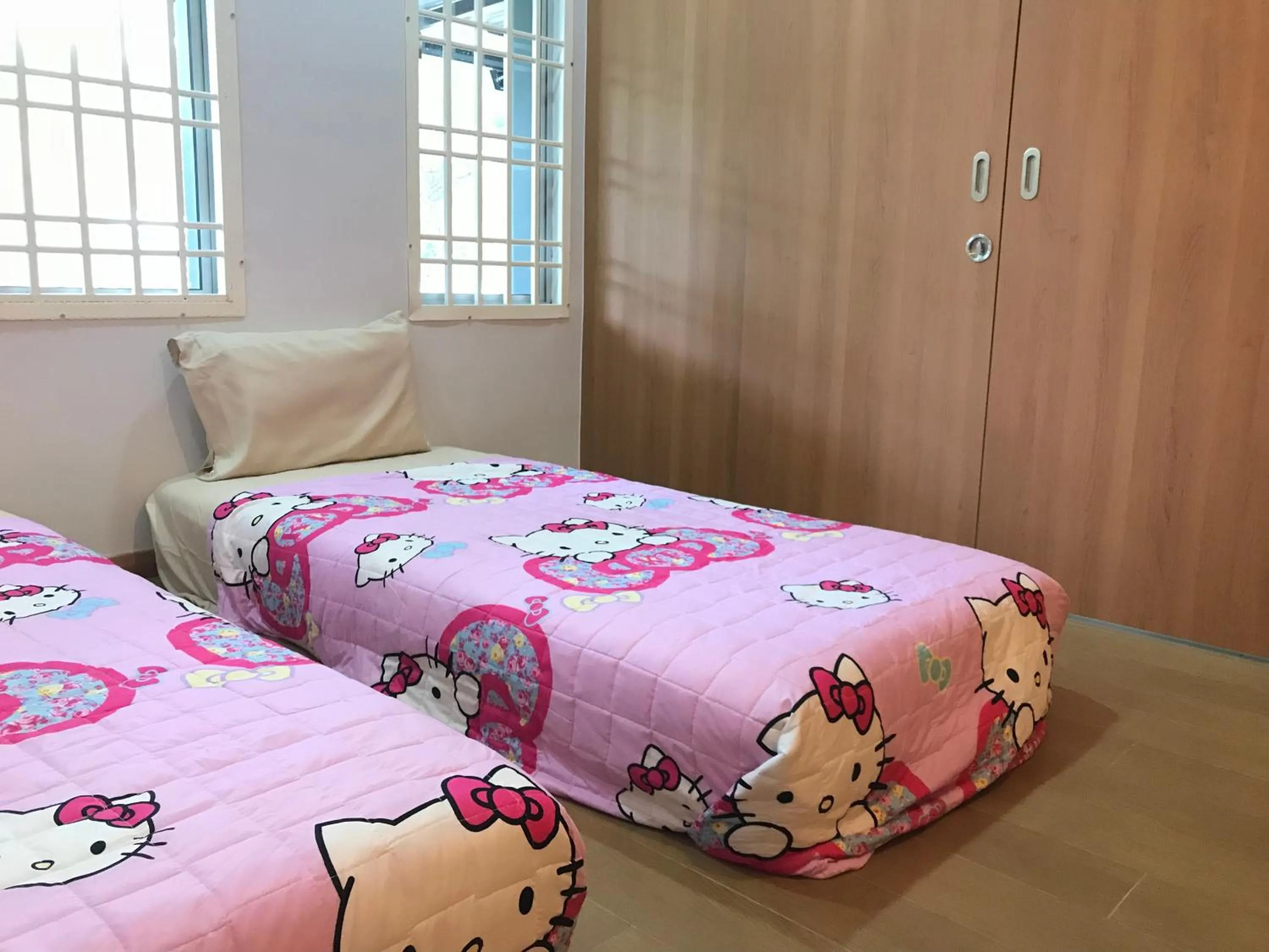 Bed in Jiaxin Homestay - JP Pedana 家馨民宿