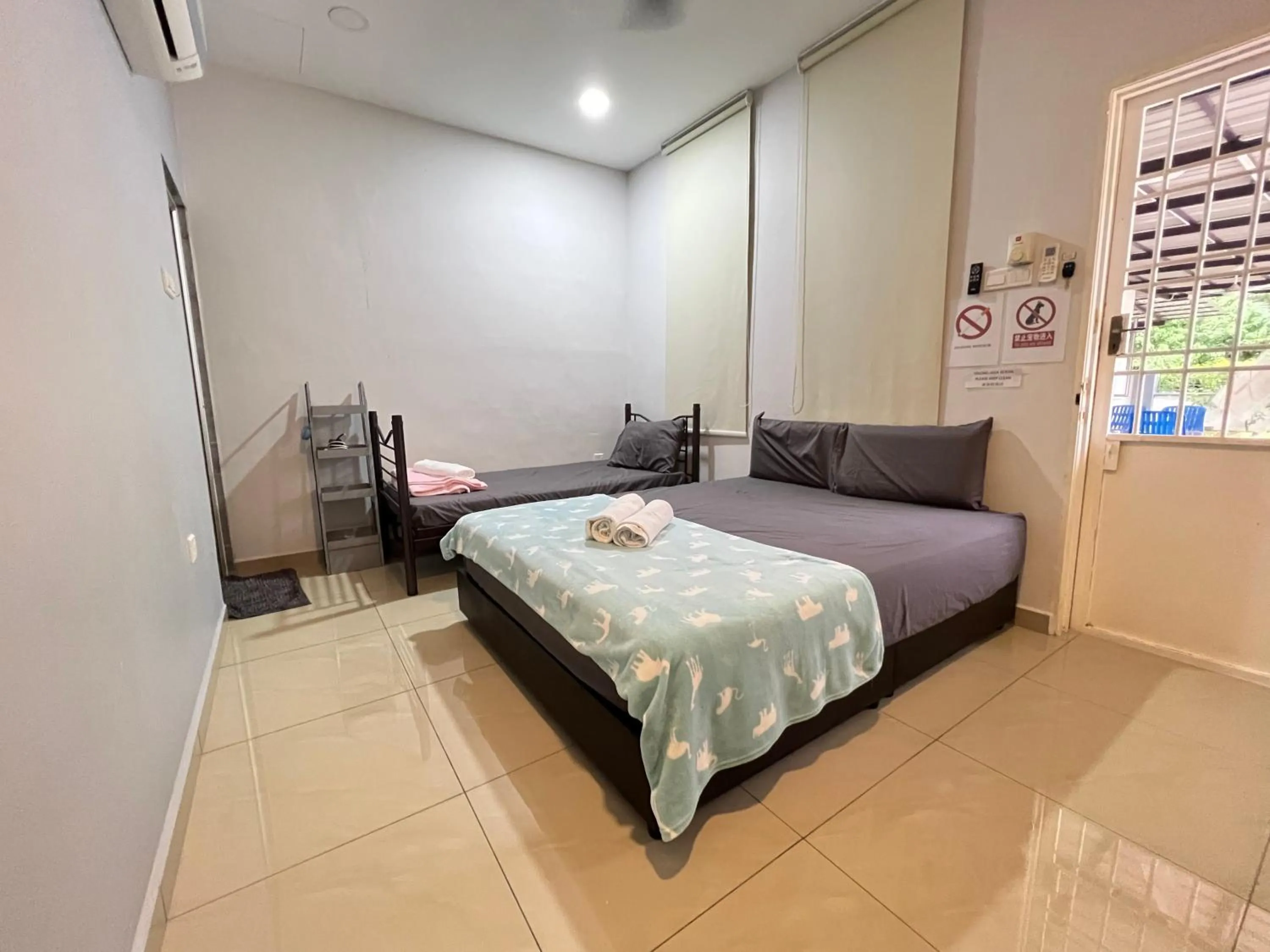 Bed in Jiaxin Homestay - JP Pedana 家馨民宿