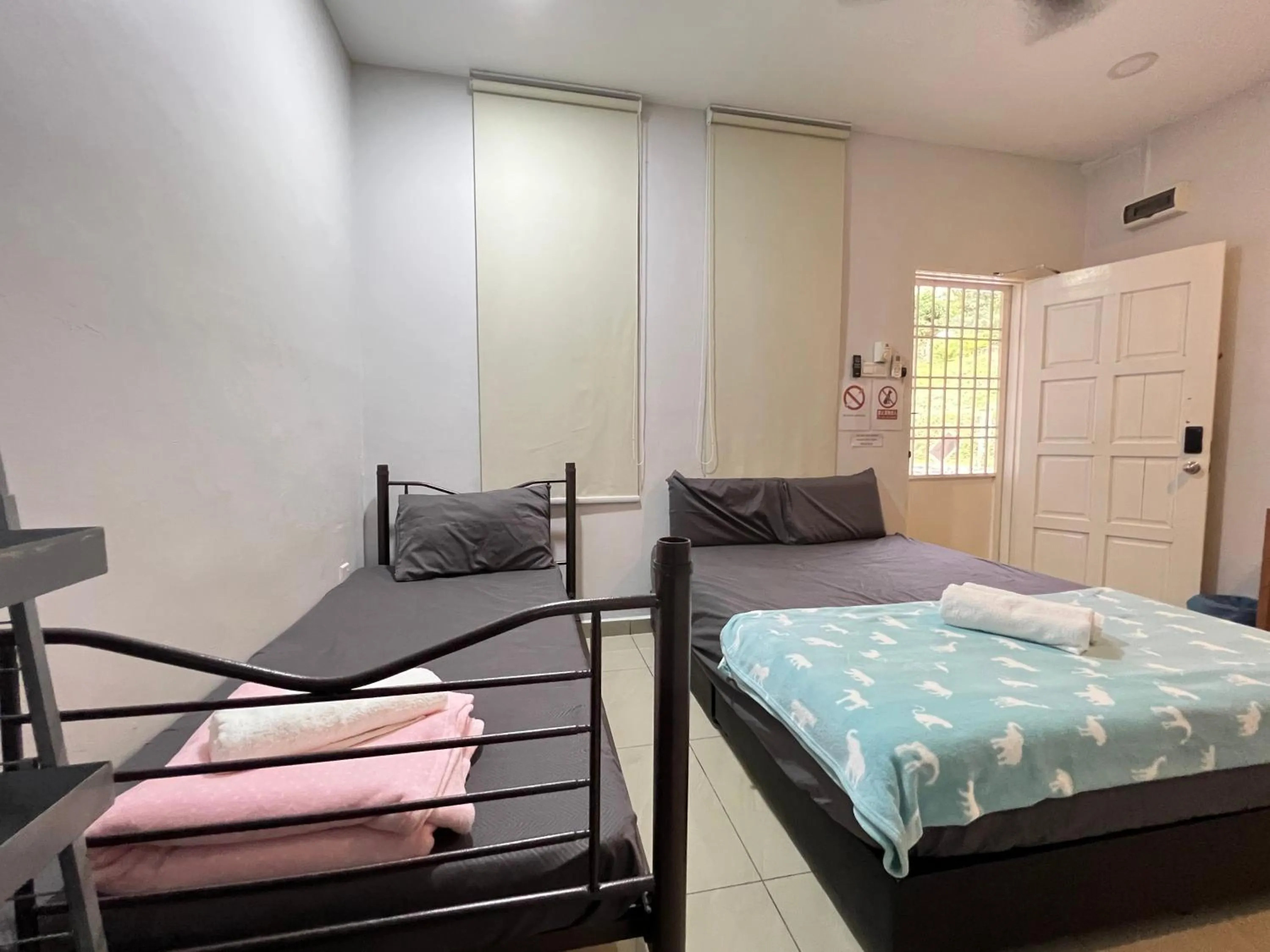 Bed in Jiaxin Homestay - JP Pedana 家馨民宿