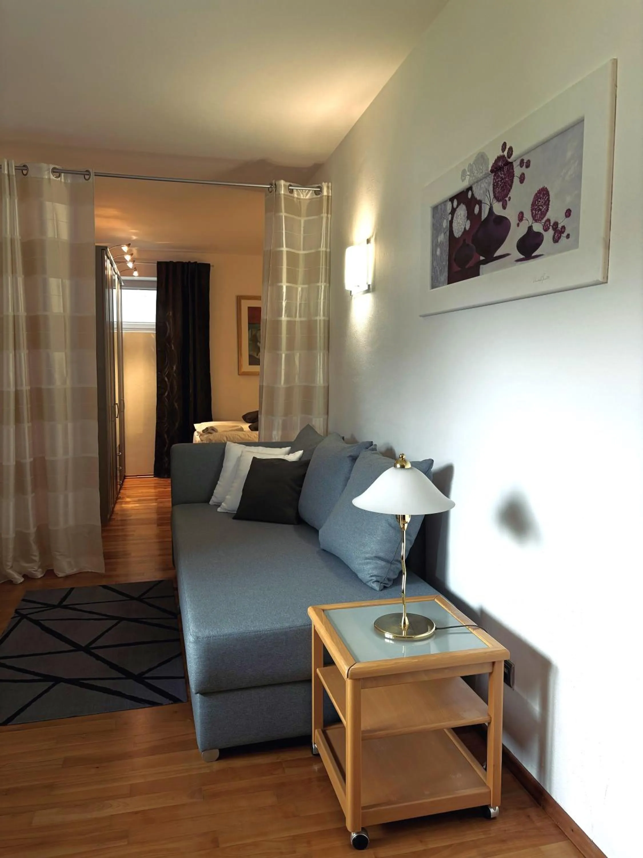 Seating area, Bed in Aparthotel Pfeffermühle