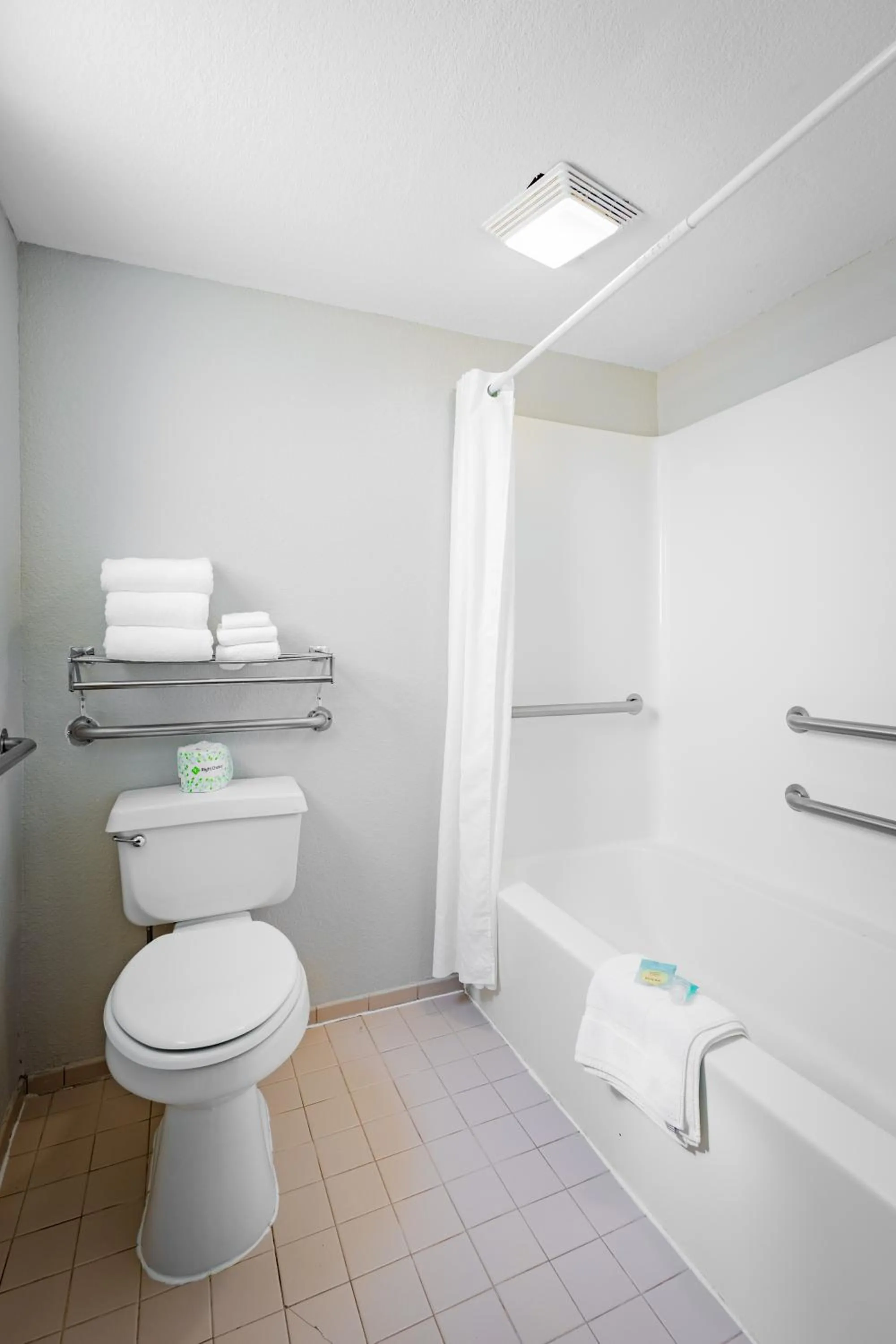 Toilet in Welcome Inn