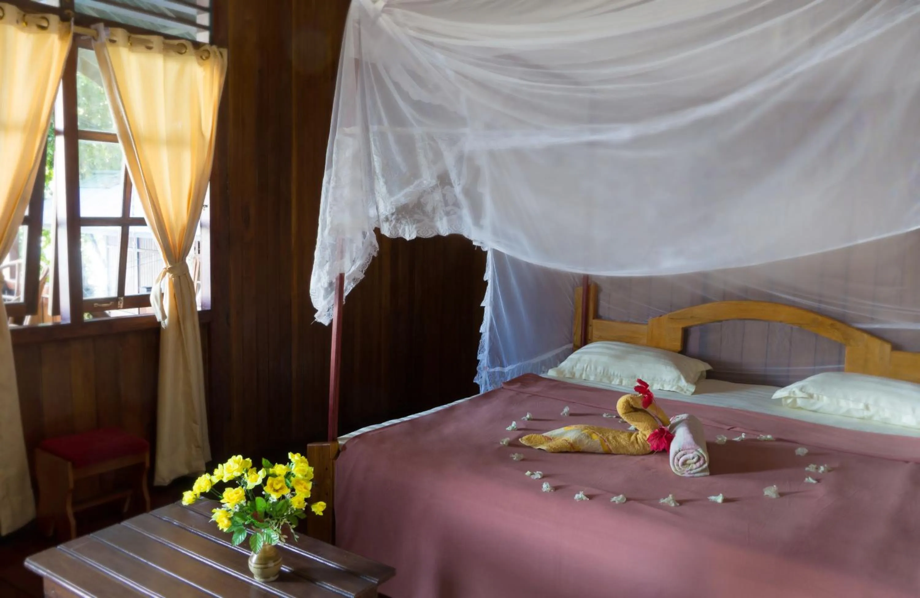 Bed in Bunaken Divers Sea Breeze Resort