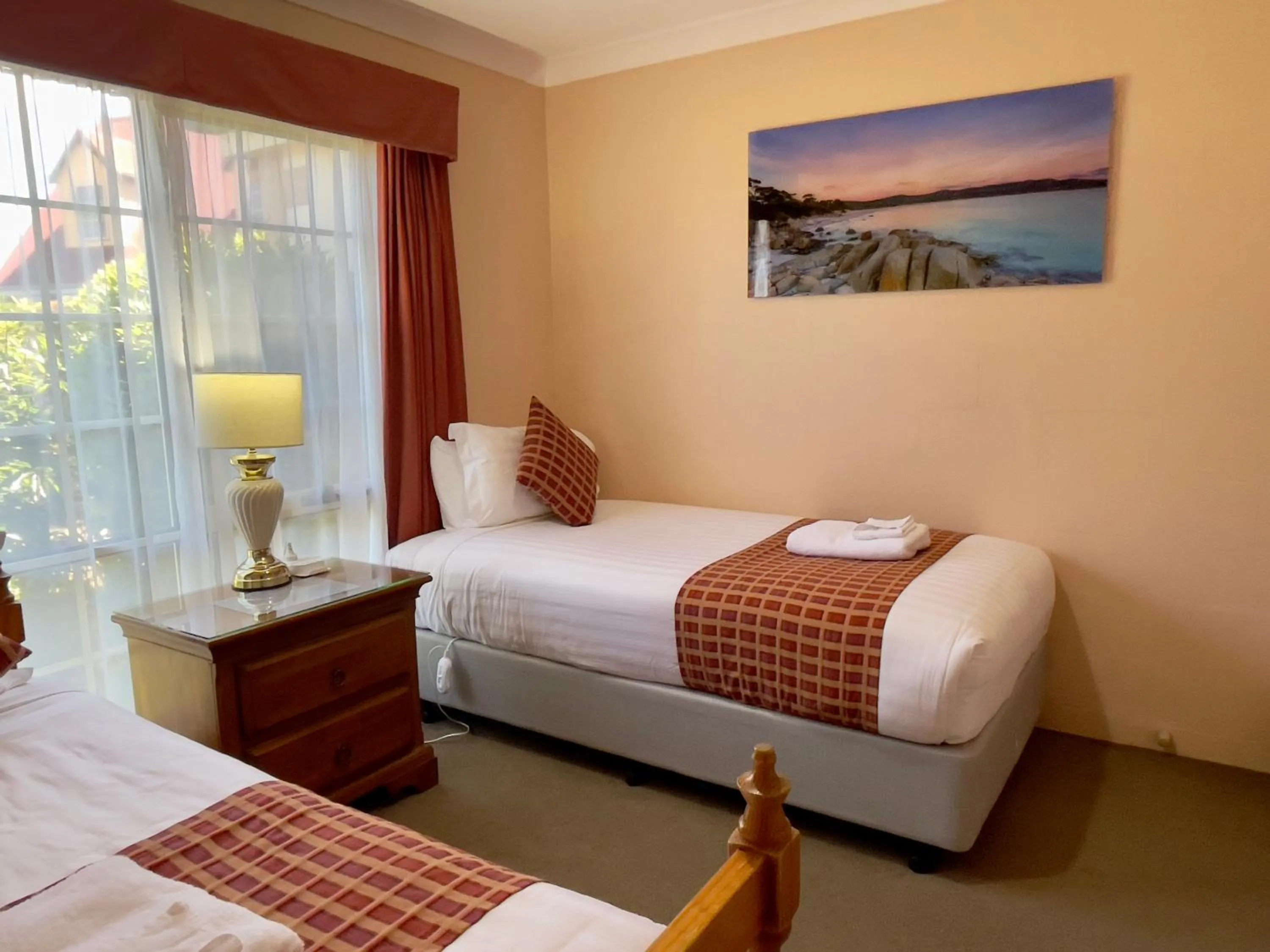 Bed in Swansea Cottages & Lodge Suites