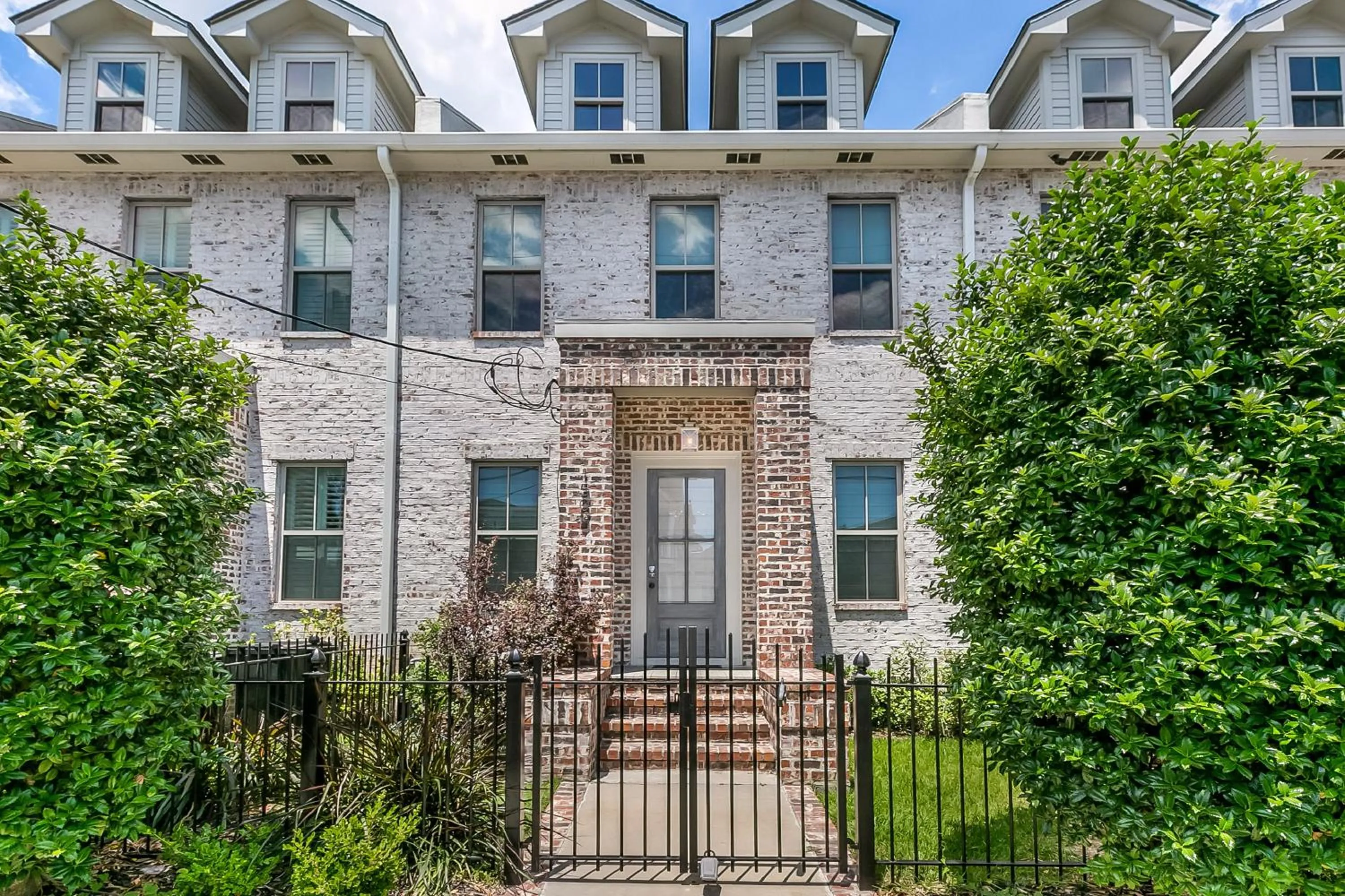 Property building in Spacious Loft-Style 3BR Townhouse by Hosteeva