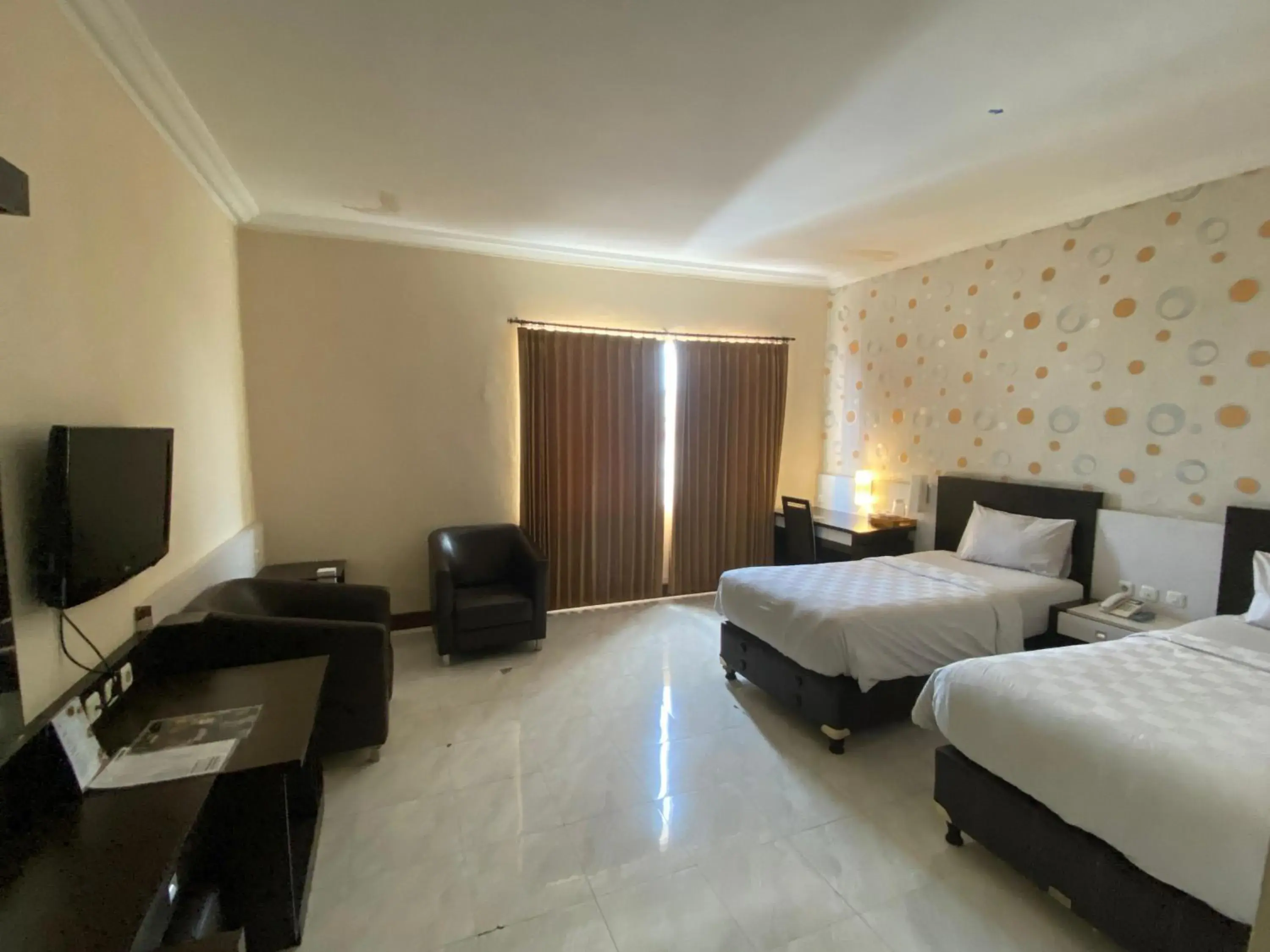 Deluxe Twin Room in Hotel 88 Jember By WH - Strategic Location In The City Center Deluxe Twin Room in Hotel 88 Jember By WH - Strategic Location In The City Center