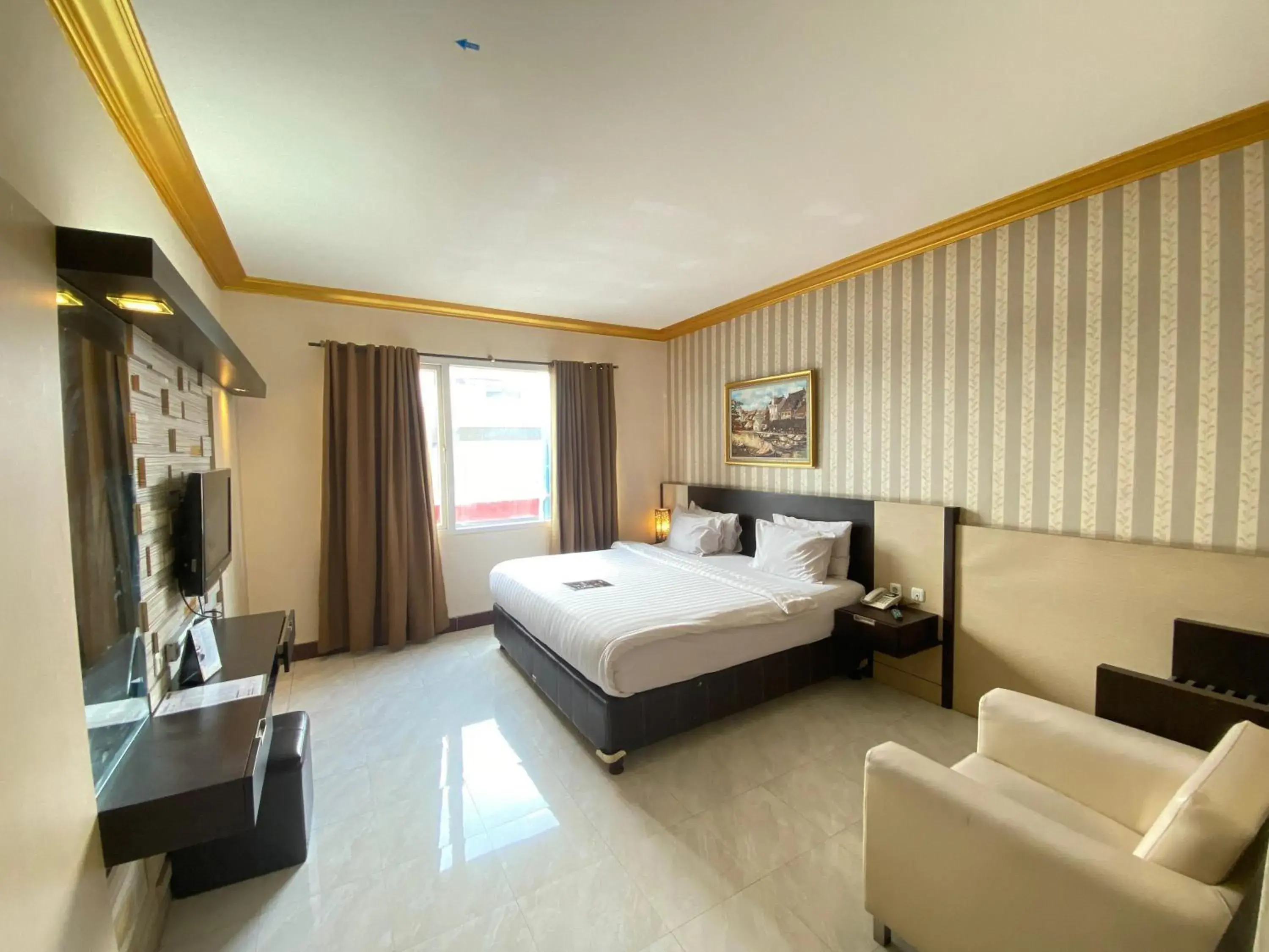 Junior Suite in Hotel 88 Jember By WH - Strategic Location In The City Center Junior Suite in Hotel 88 Jember By WH - Strategic Location In The City Center