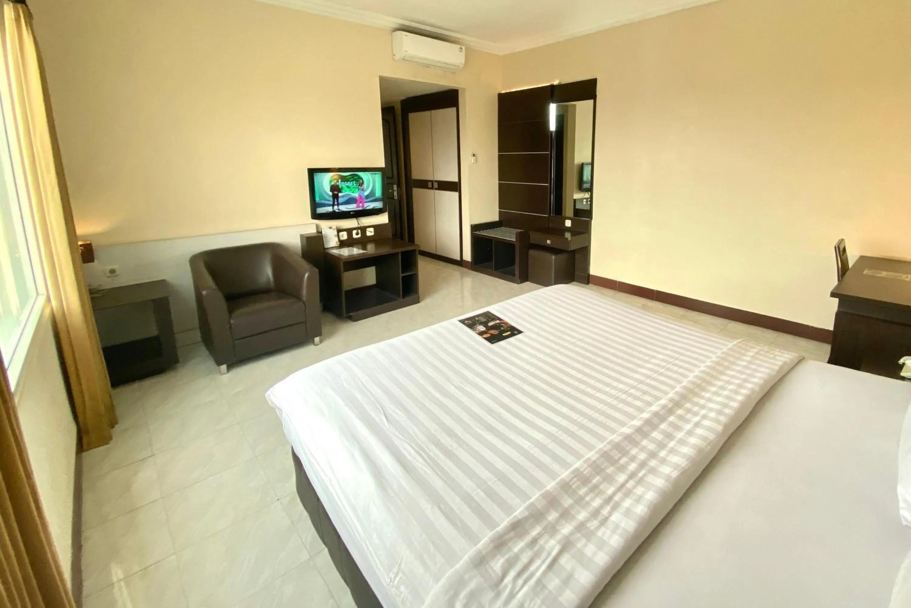 Bed in Hotel 88 Jember By WH - Strategic Location In The City Center