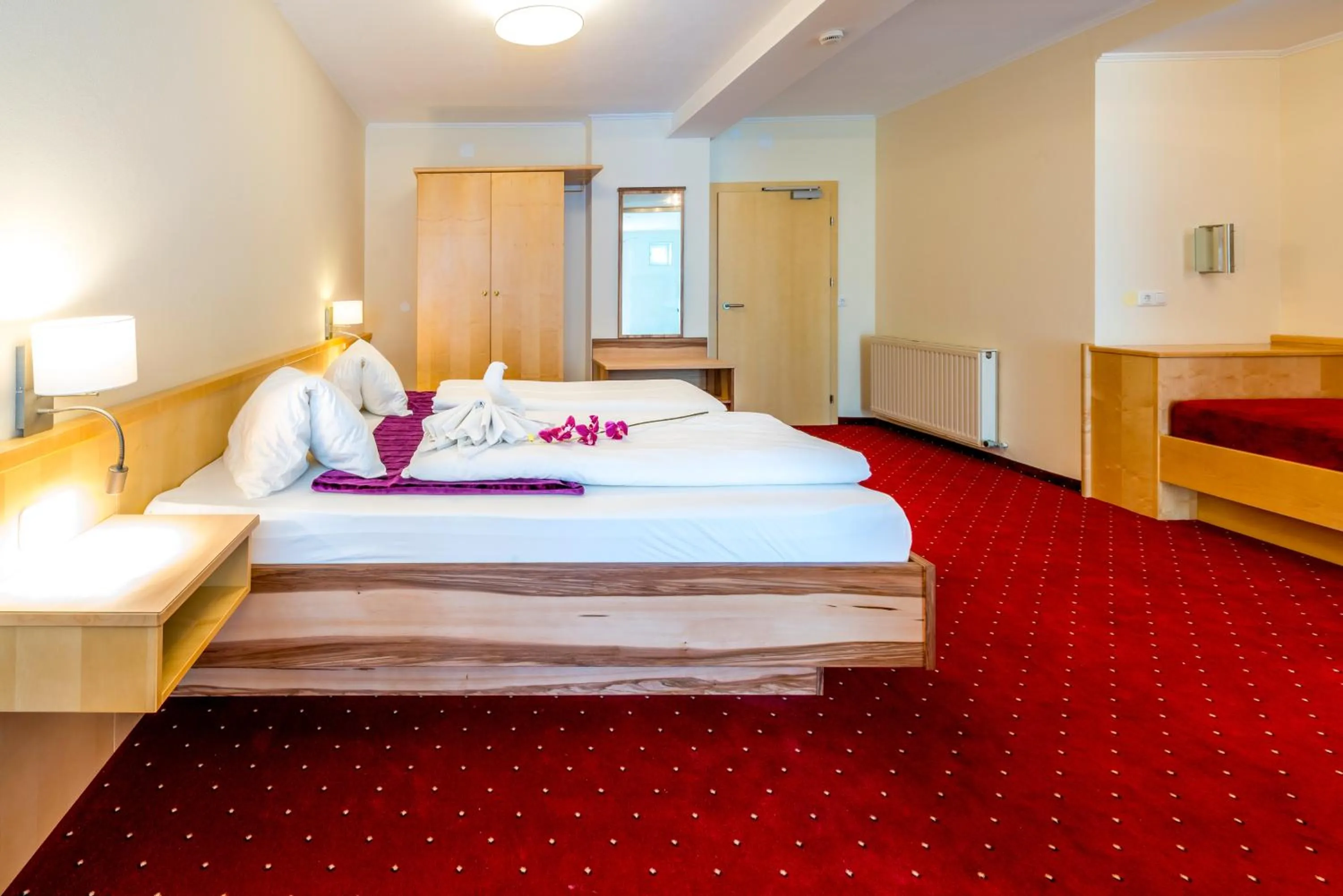 Photo of the whole room, Bed in Panorama Hotel Traunstein