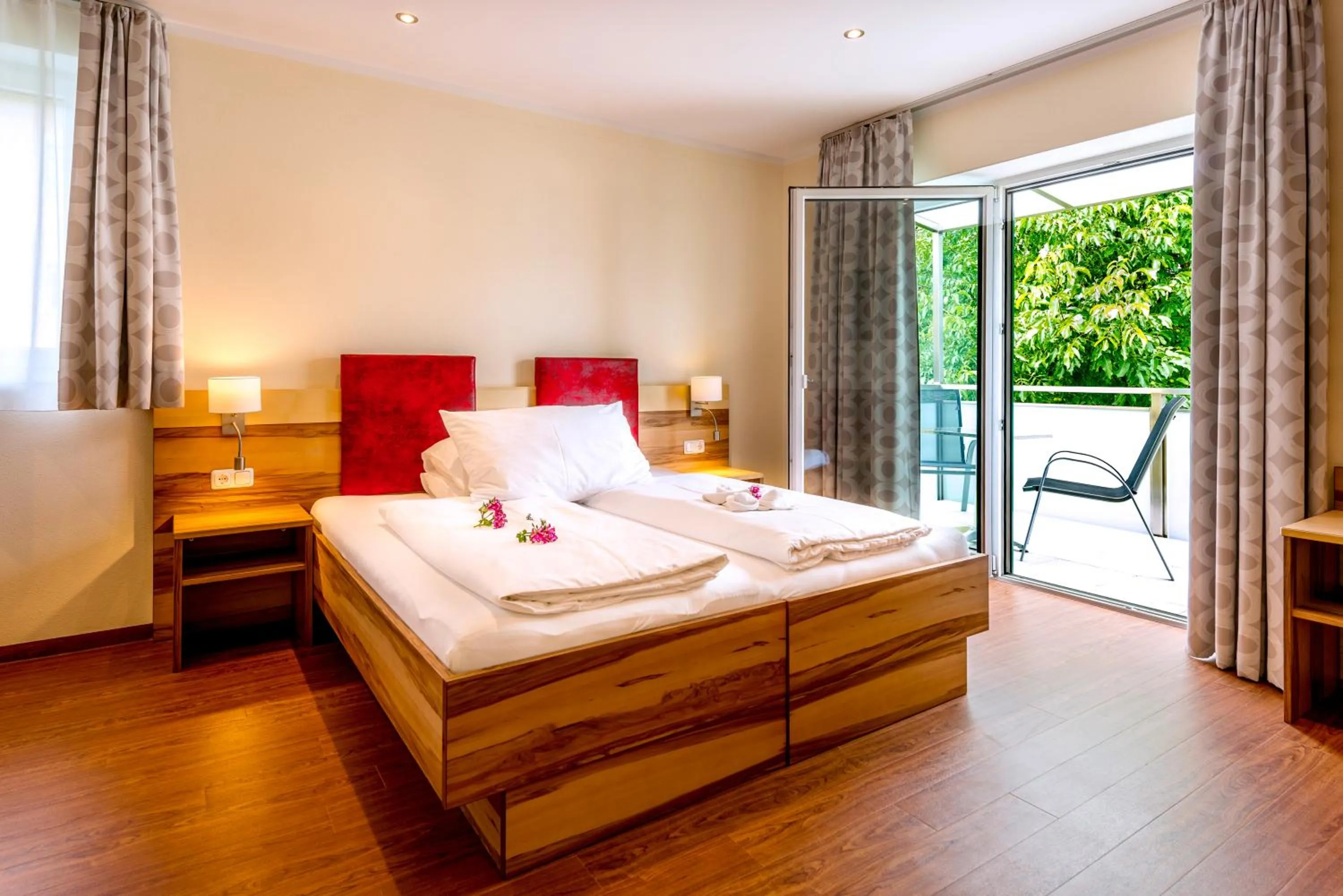 Photo of the whole room, Bed in Panorama Hotel Traunstein