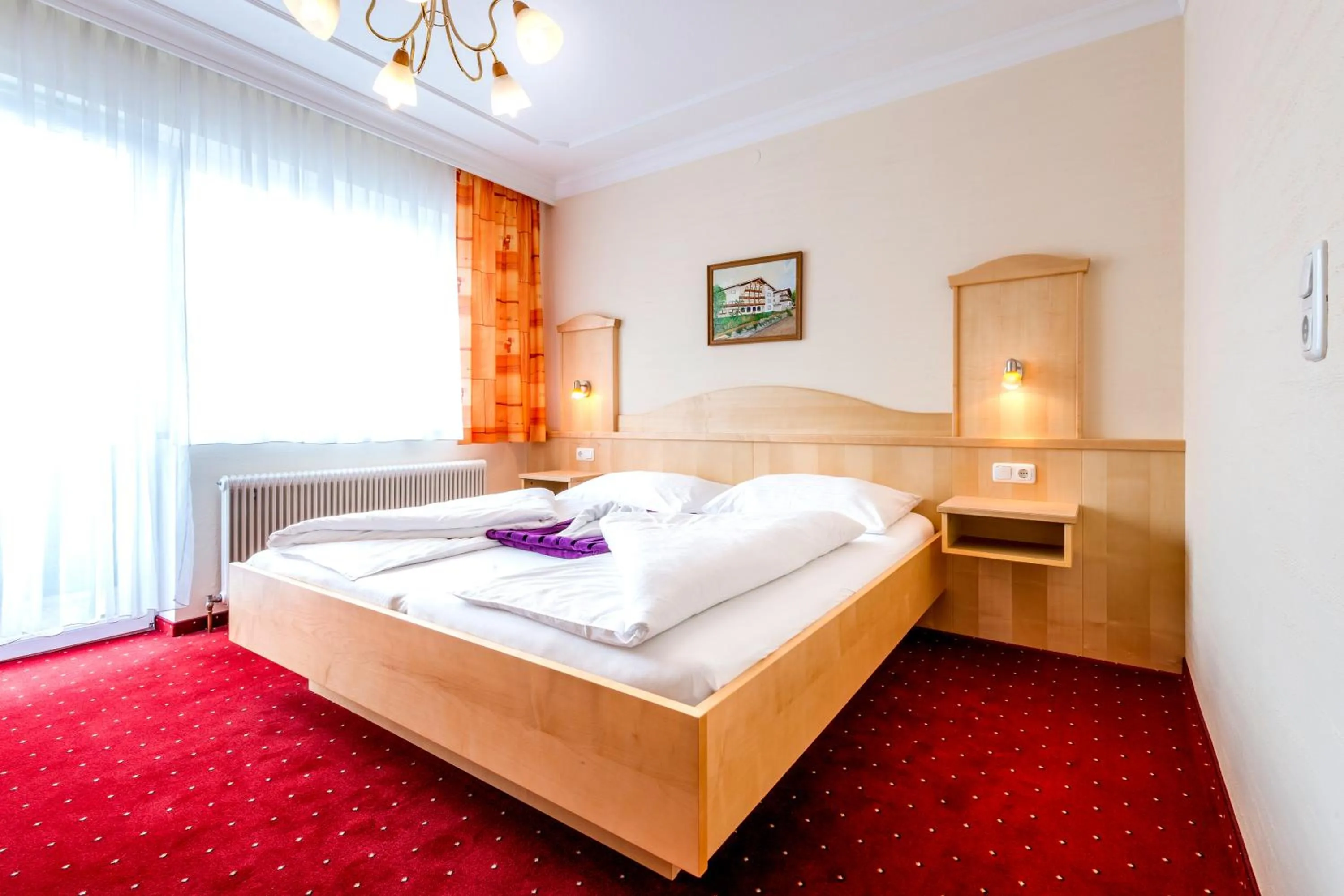 Photo of the whole room, Bed in Panorama Hotel Traunstein