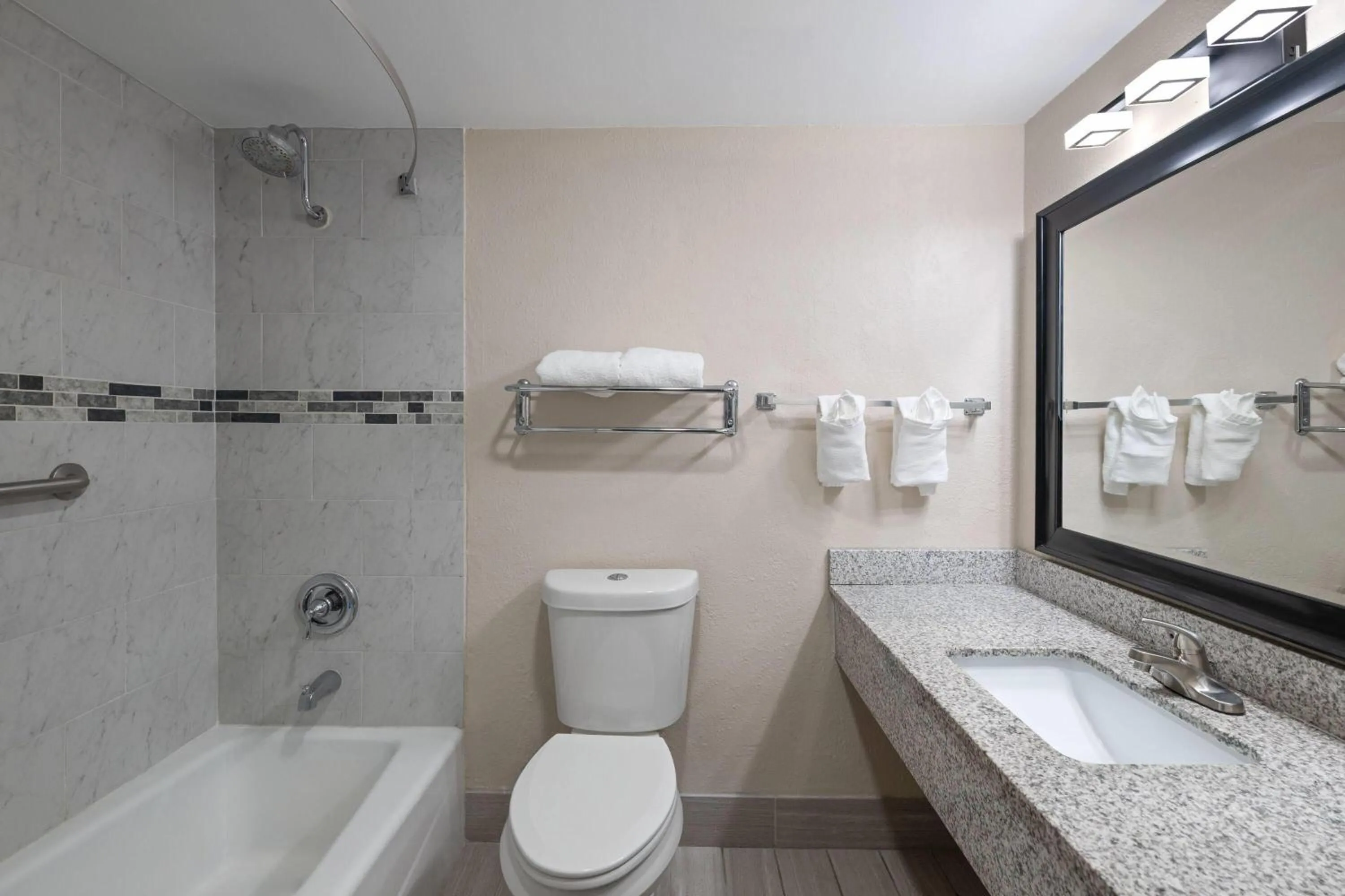 Bathroom in Super 8 by Wyndham Lake City