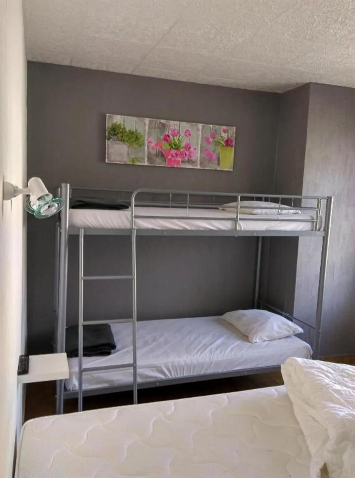 Bed in Cit'Hôtel La Résidence