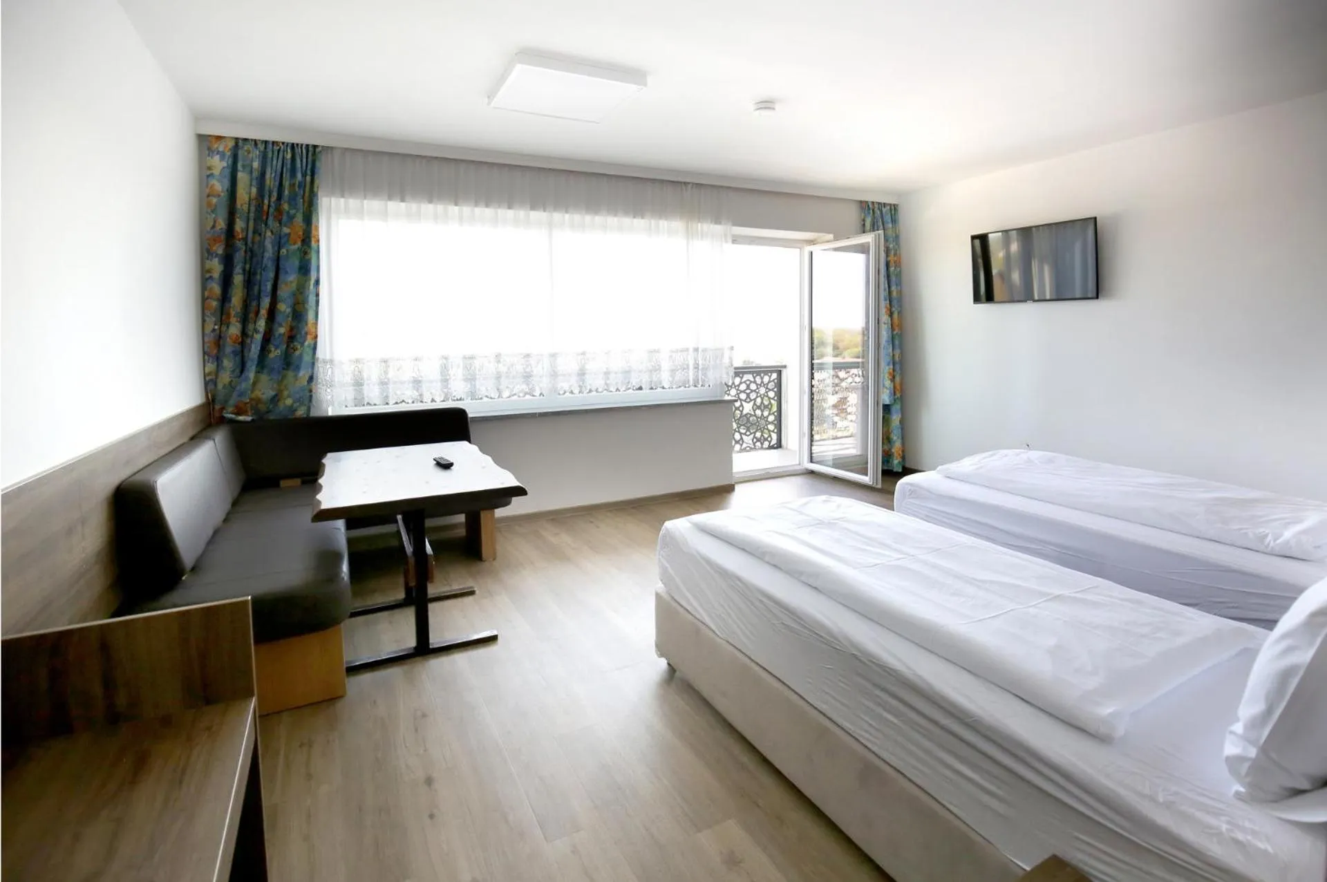 Living room, Bed in F Hotel 24h Check-In