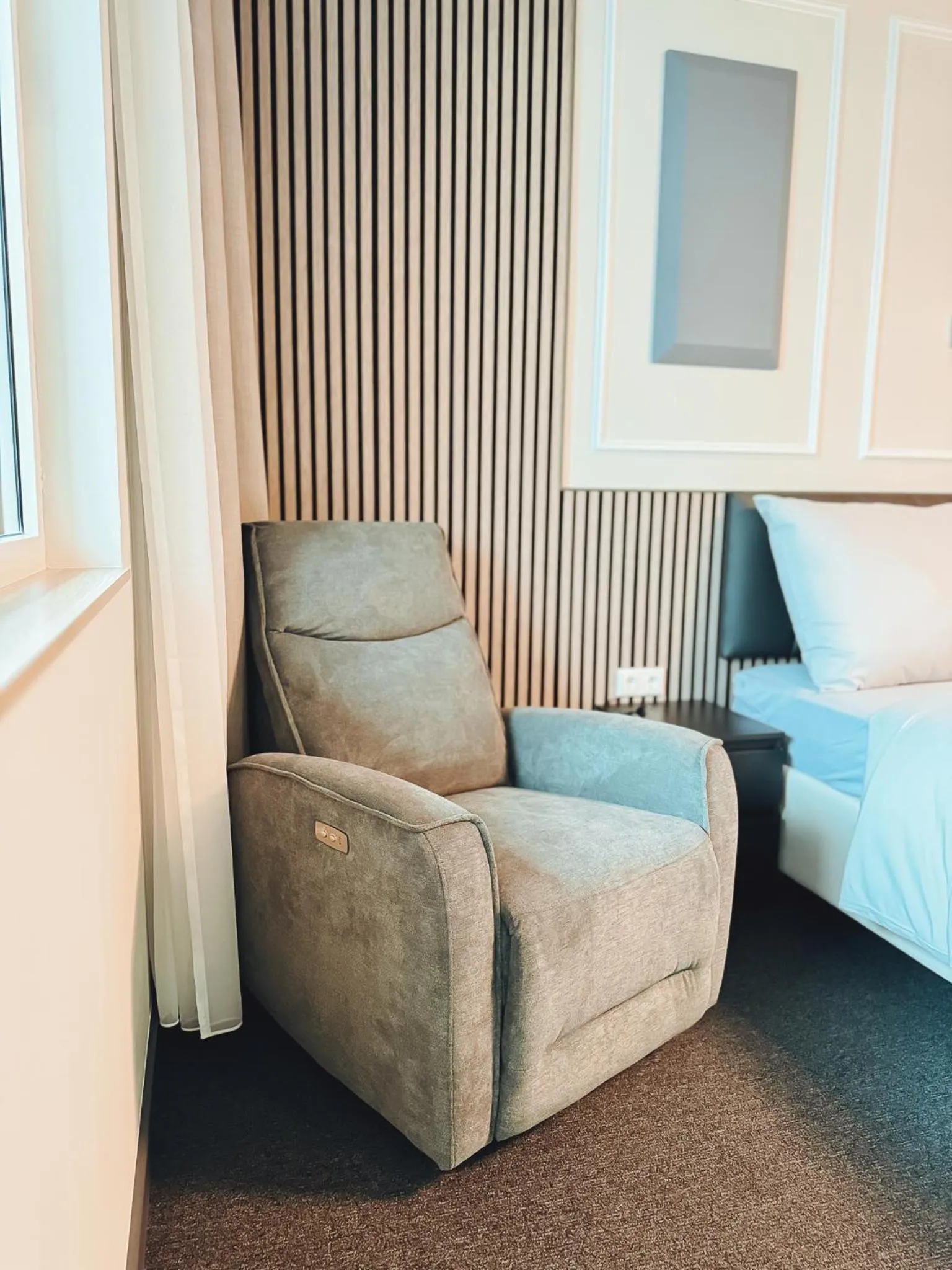 Seating area, Bed in F Hotel 24h Check-In