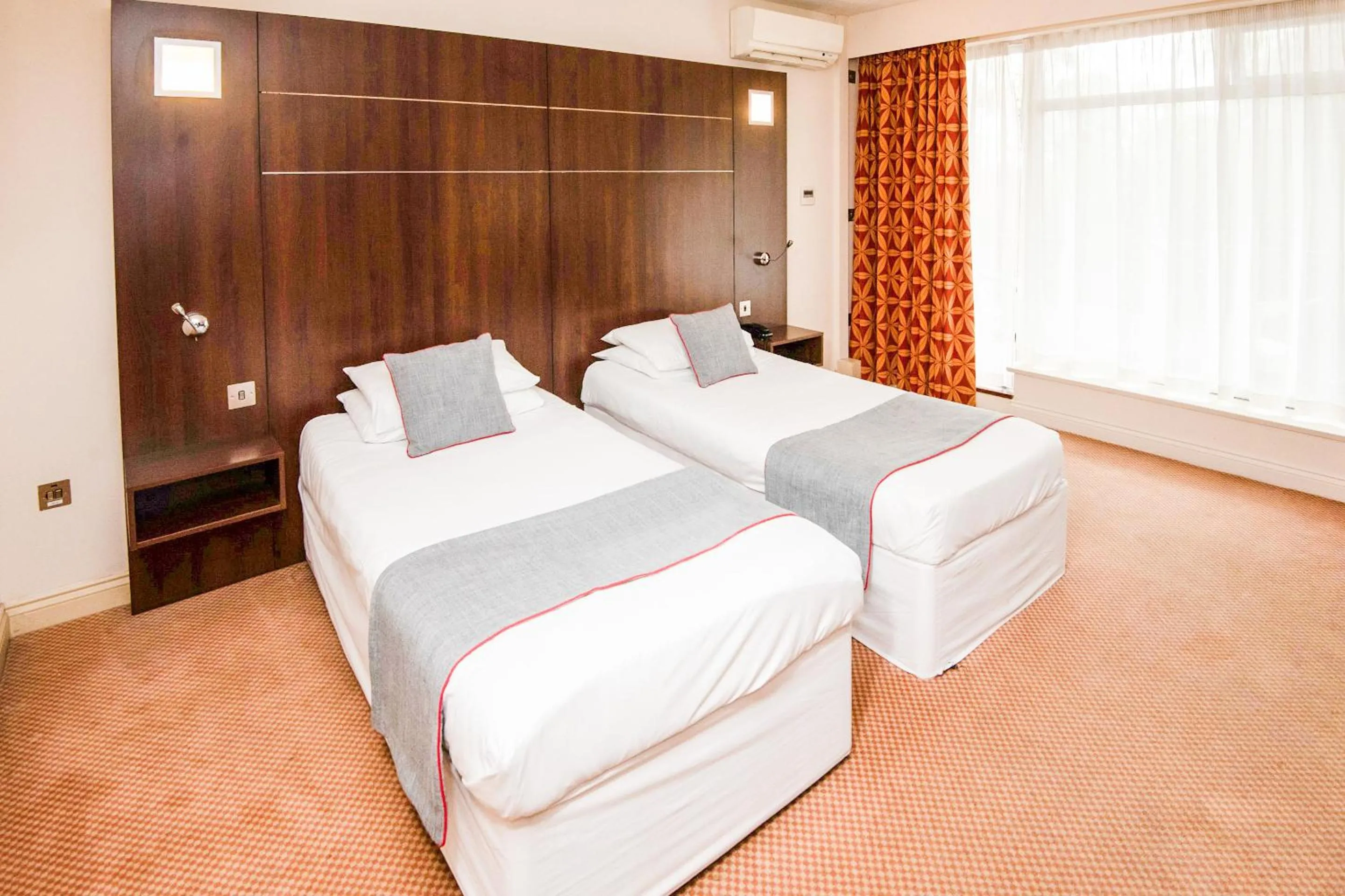 Bed in The Bridge House Hotel