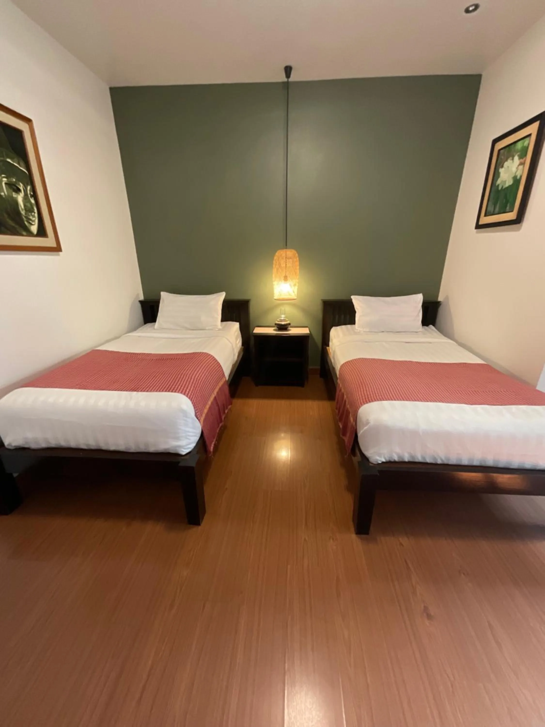 Bed in Baan Klang Vieng