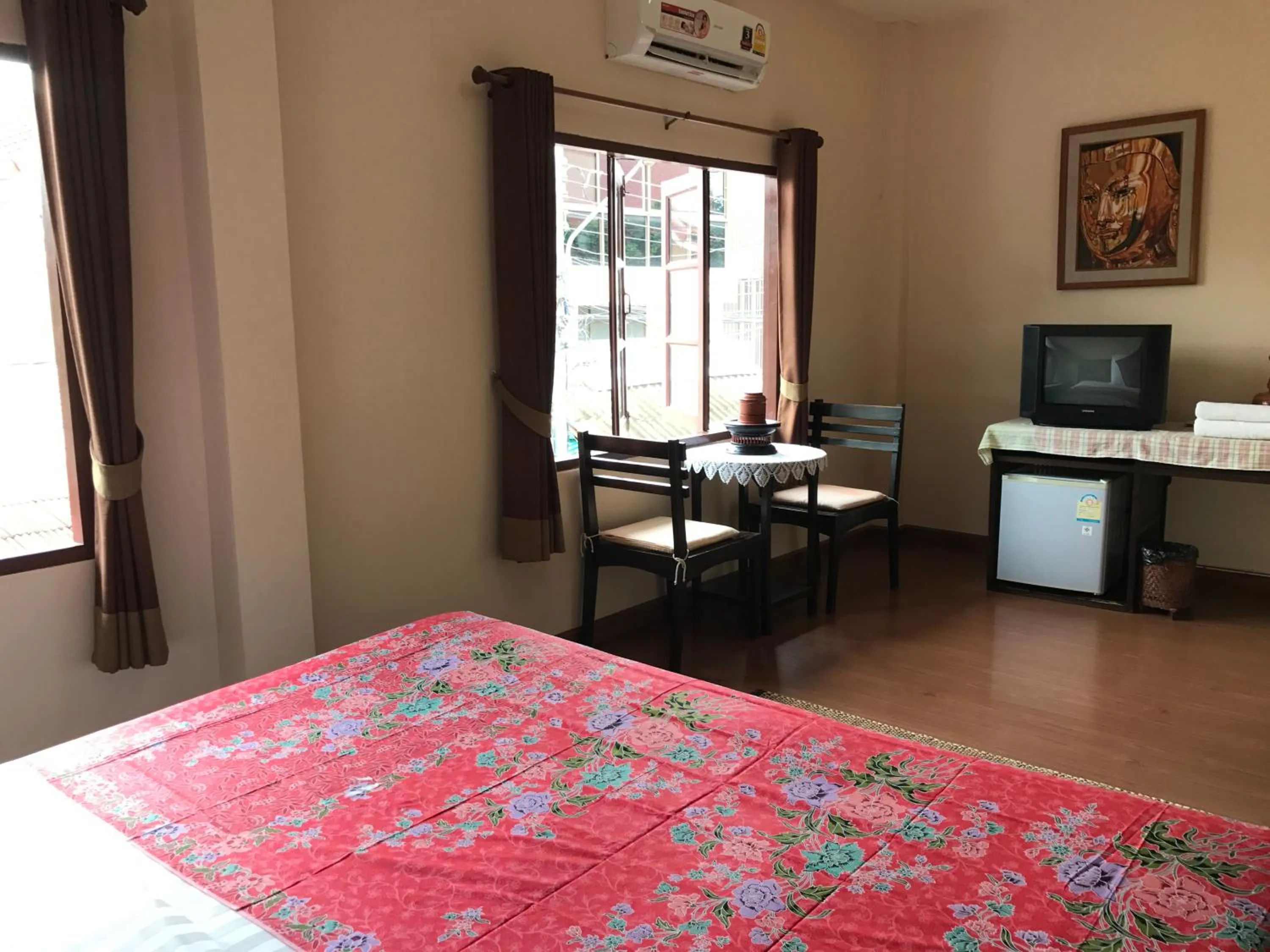 Bed in Baan Klang Vieng