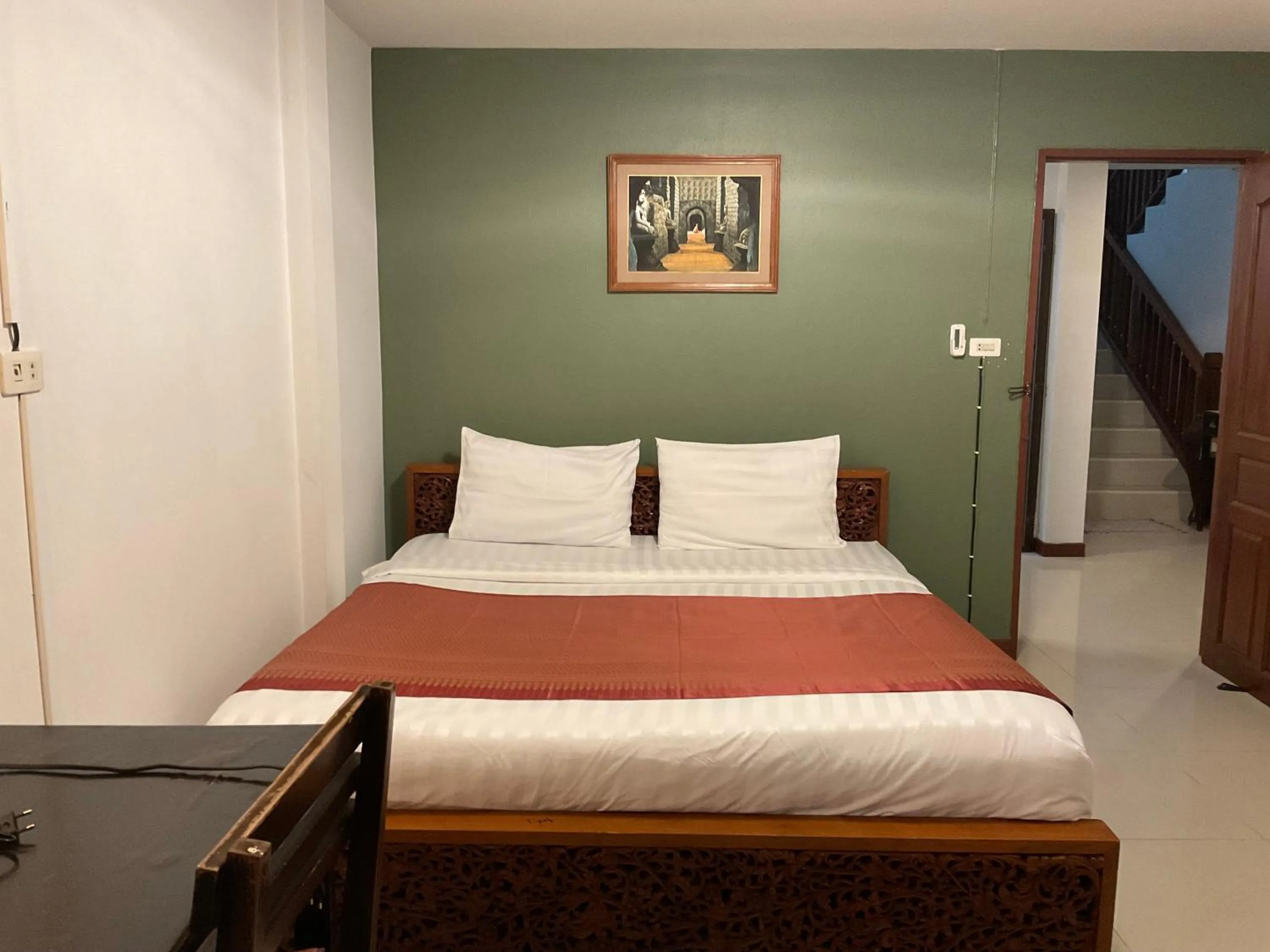 Bed in Baan Klang Vieng